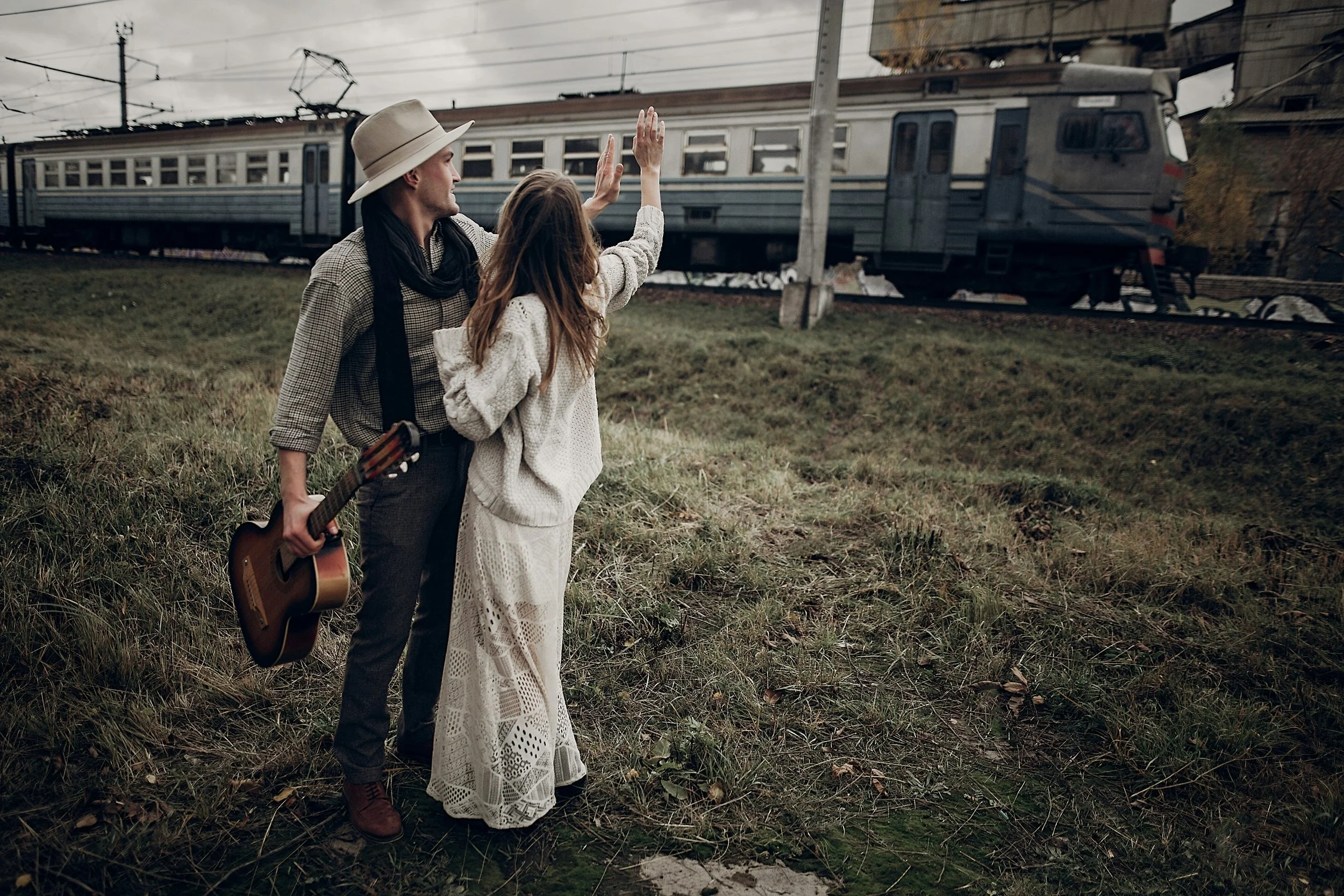 couple by vintage train