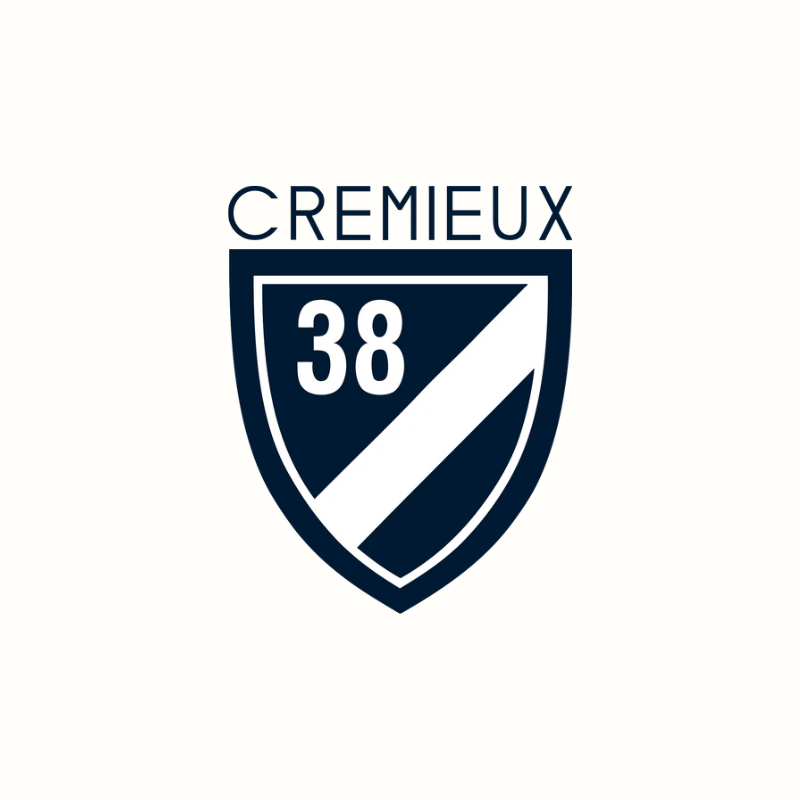 Logo avec le texte 'CREMIEUX 38' sur un bouclier bleu foncé, blanc et noir.