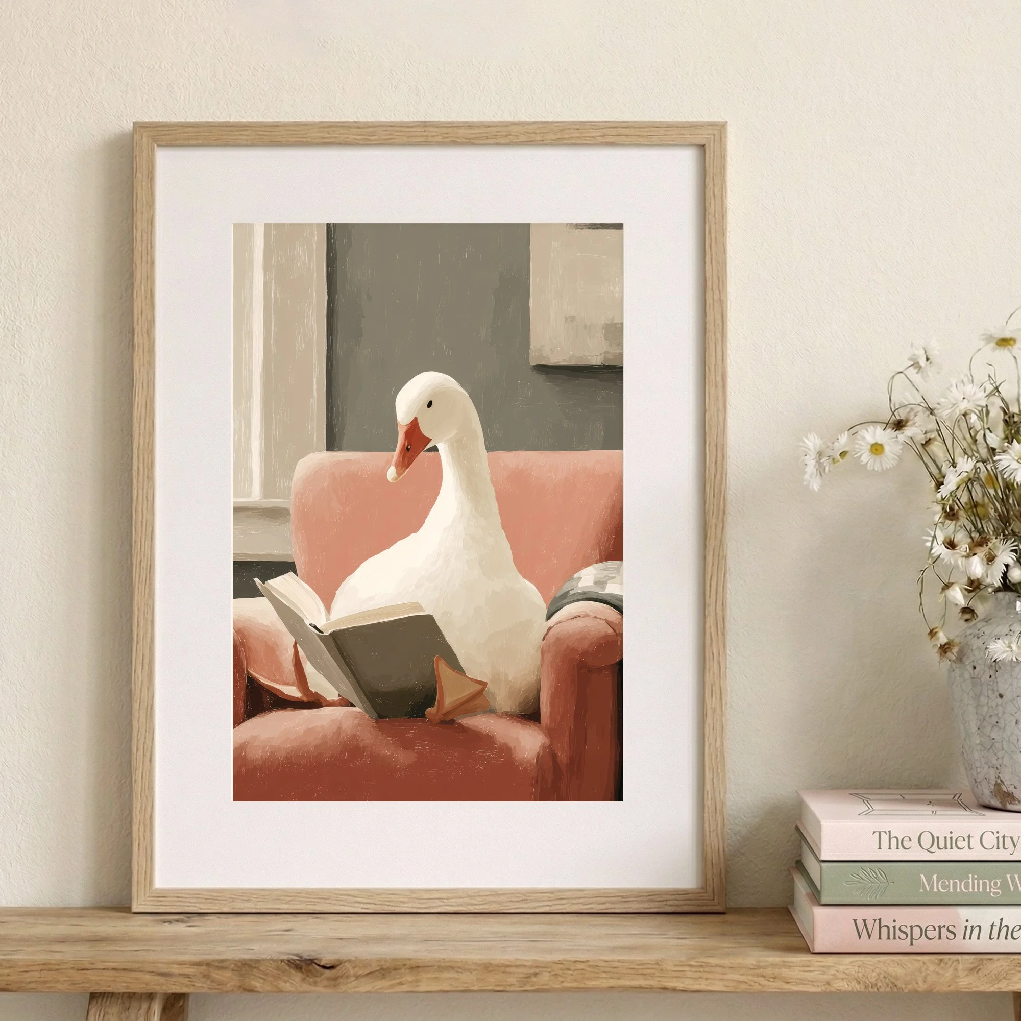 white-goose-reading-pink-sofa-framed-print.jpg