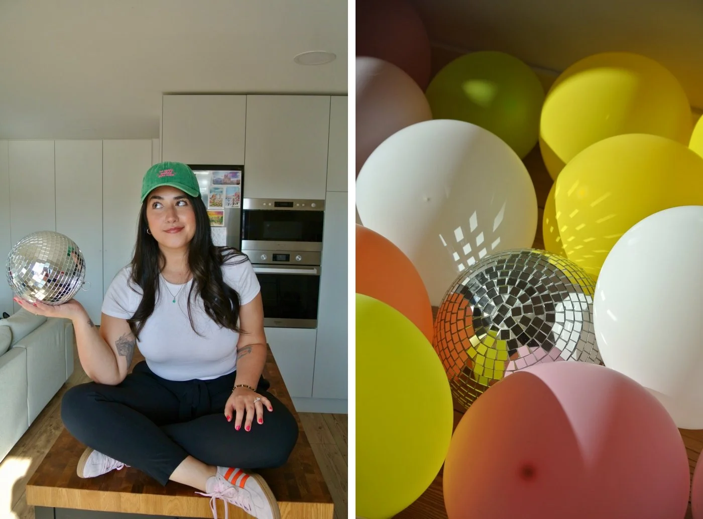 A woman with long dark hair wearing a green hat sits on a kitchen countertop holding a disco ball