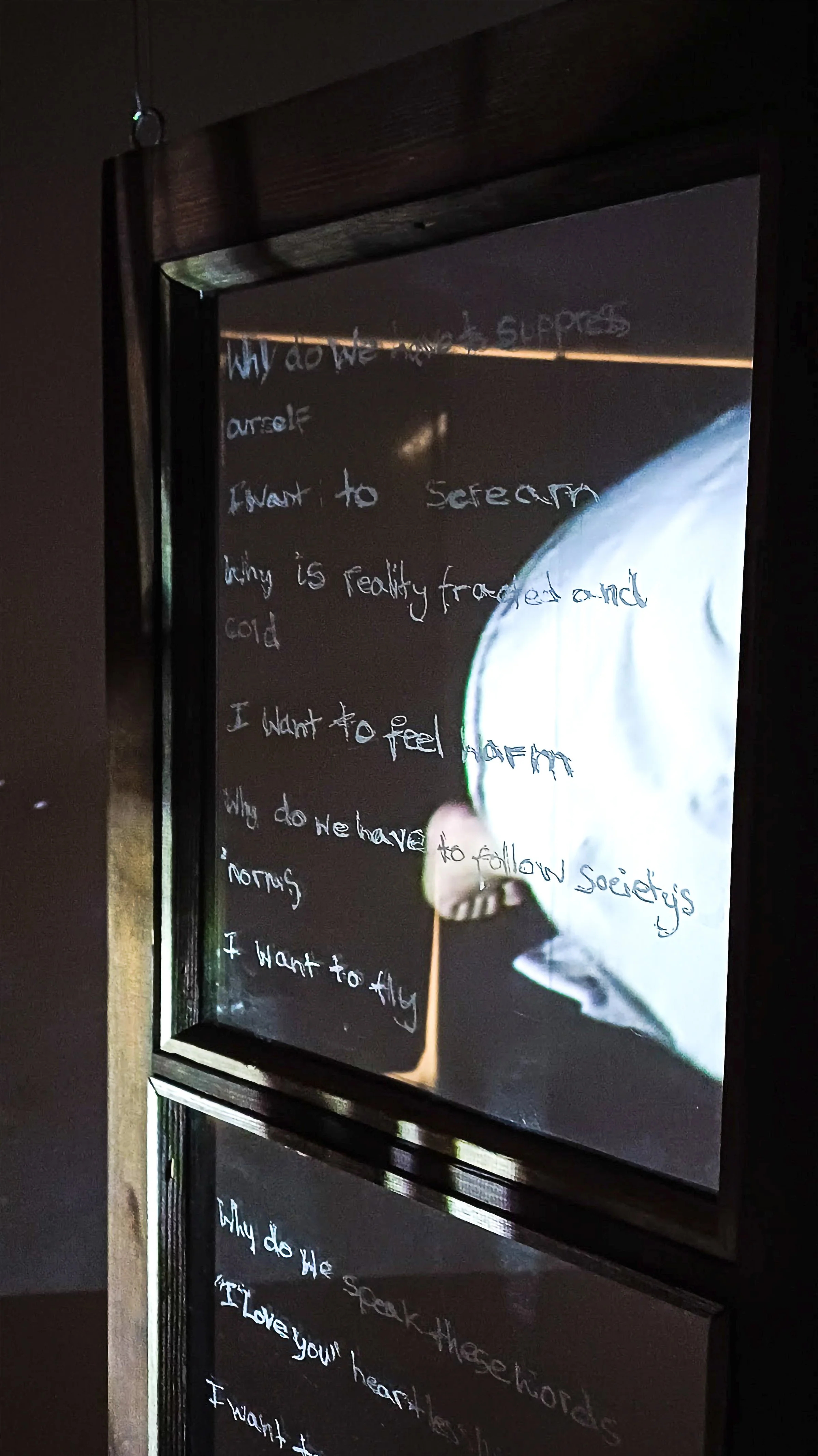 Why Do We Have to Suppress Ourselves? 2024. Laser-engraved poem on old glass window, standalone piece & part of installation