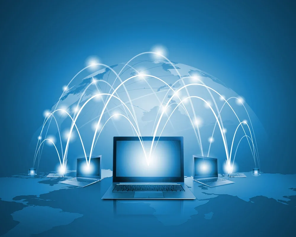 Laptops against globe blue illustration.webp