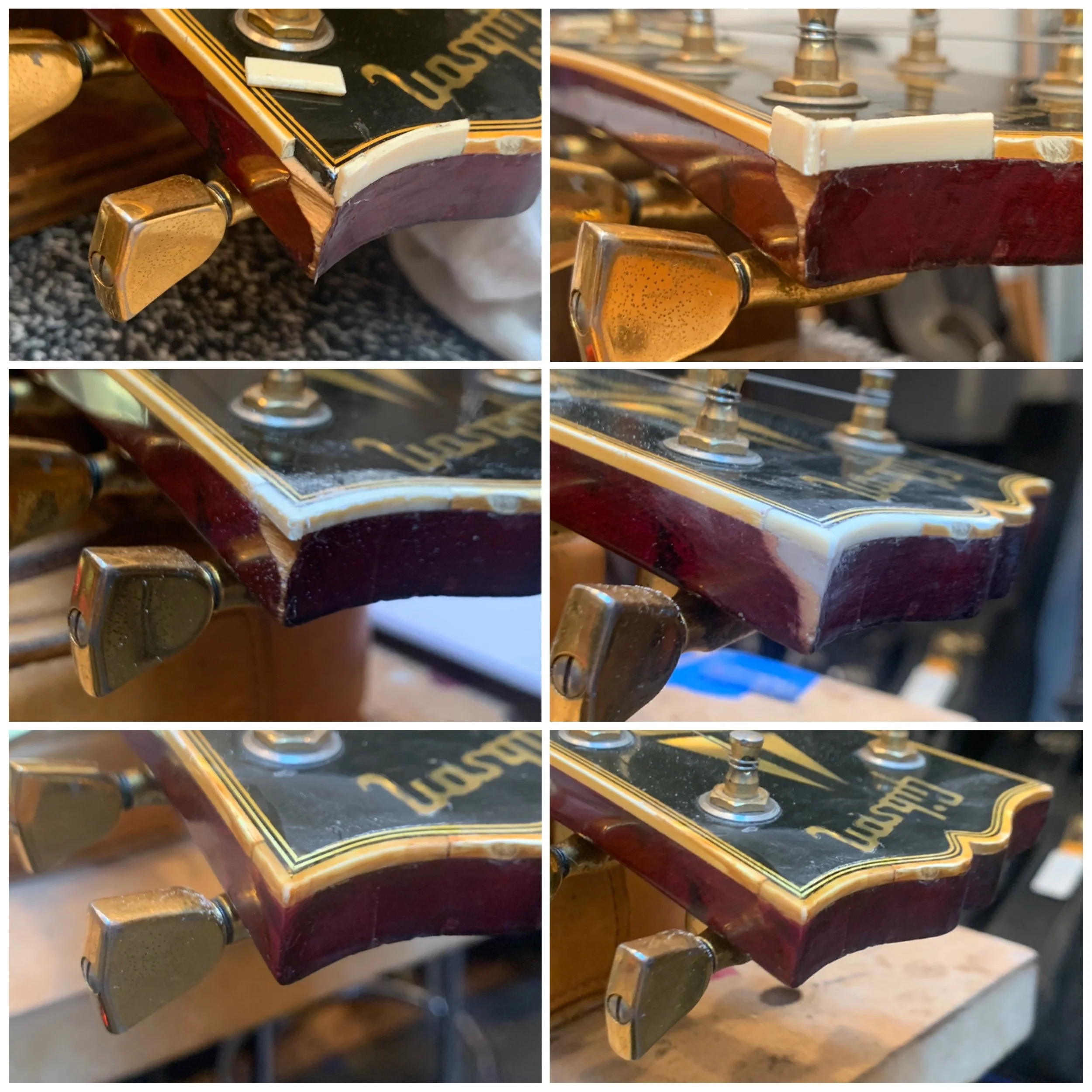 Close-up of a guitar headstock with tuning pegs and tuning keys, showing signs of use and wear.