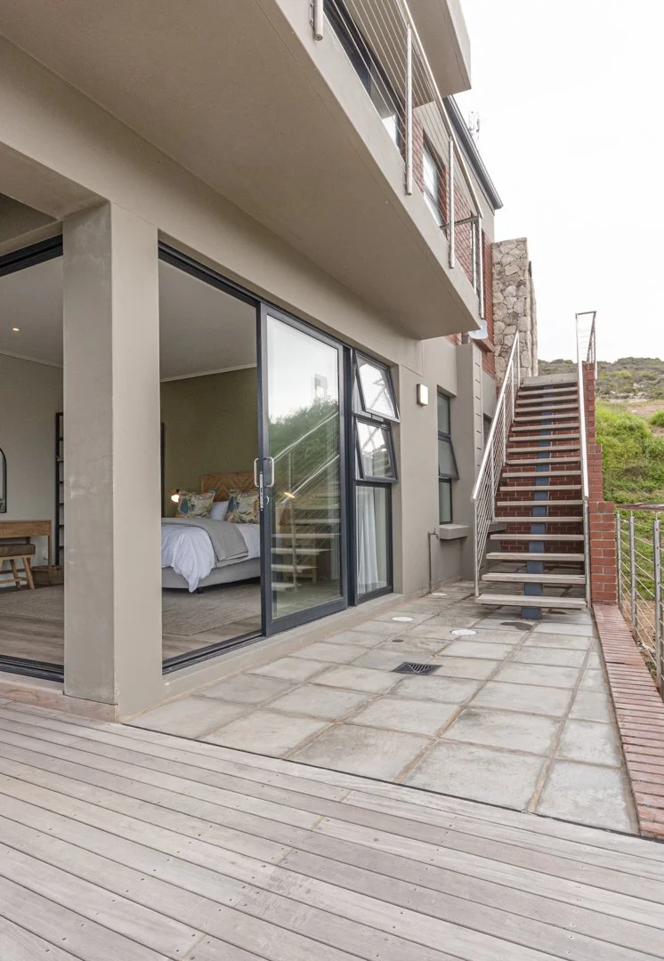 Side entrace/exit from parking area.