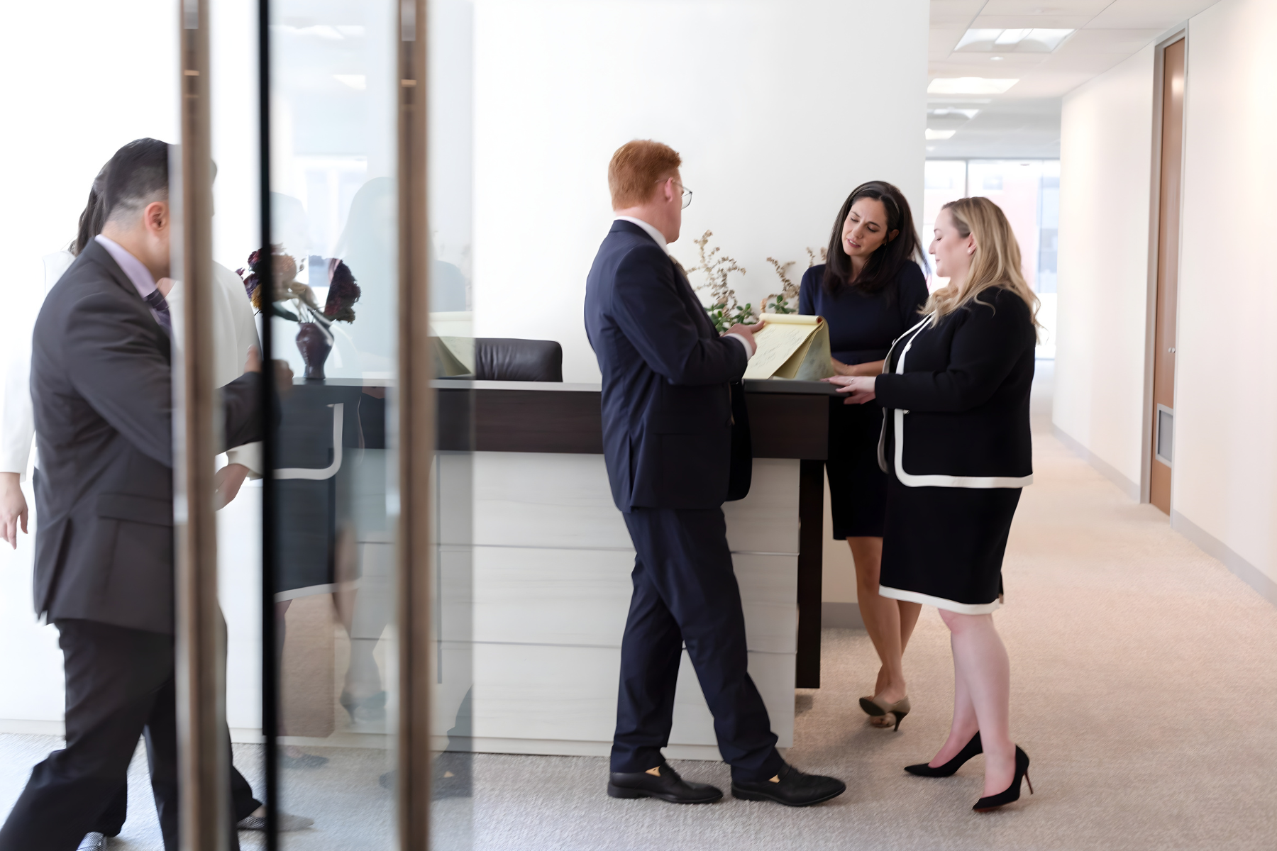 about block reid full team speaking by reception desk hoffenberg chicago illinois family law attorneys