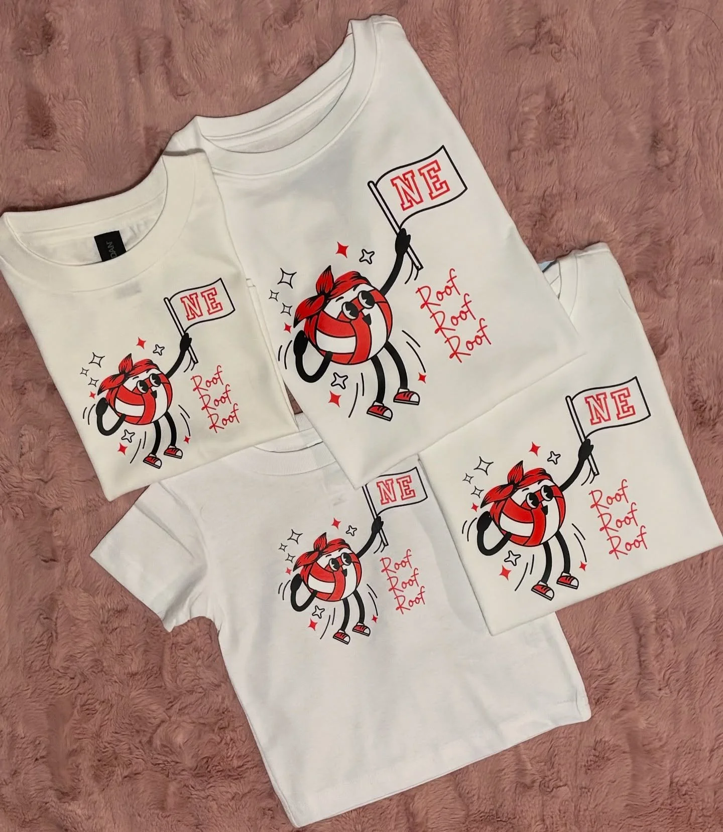 Raising the next generation of Husker volleyball fans. Tiny fans, BIG Husker energy 💪🌽🏐 
#GoBigRed #NebraskaVolleyball #CustomTees #MatchingShirts #FamilyGameDay #gamedayshirts #futurehusker