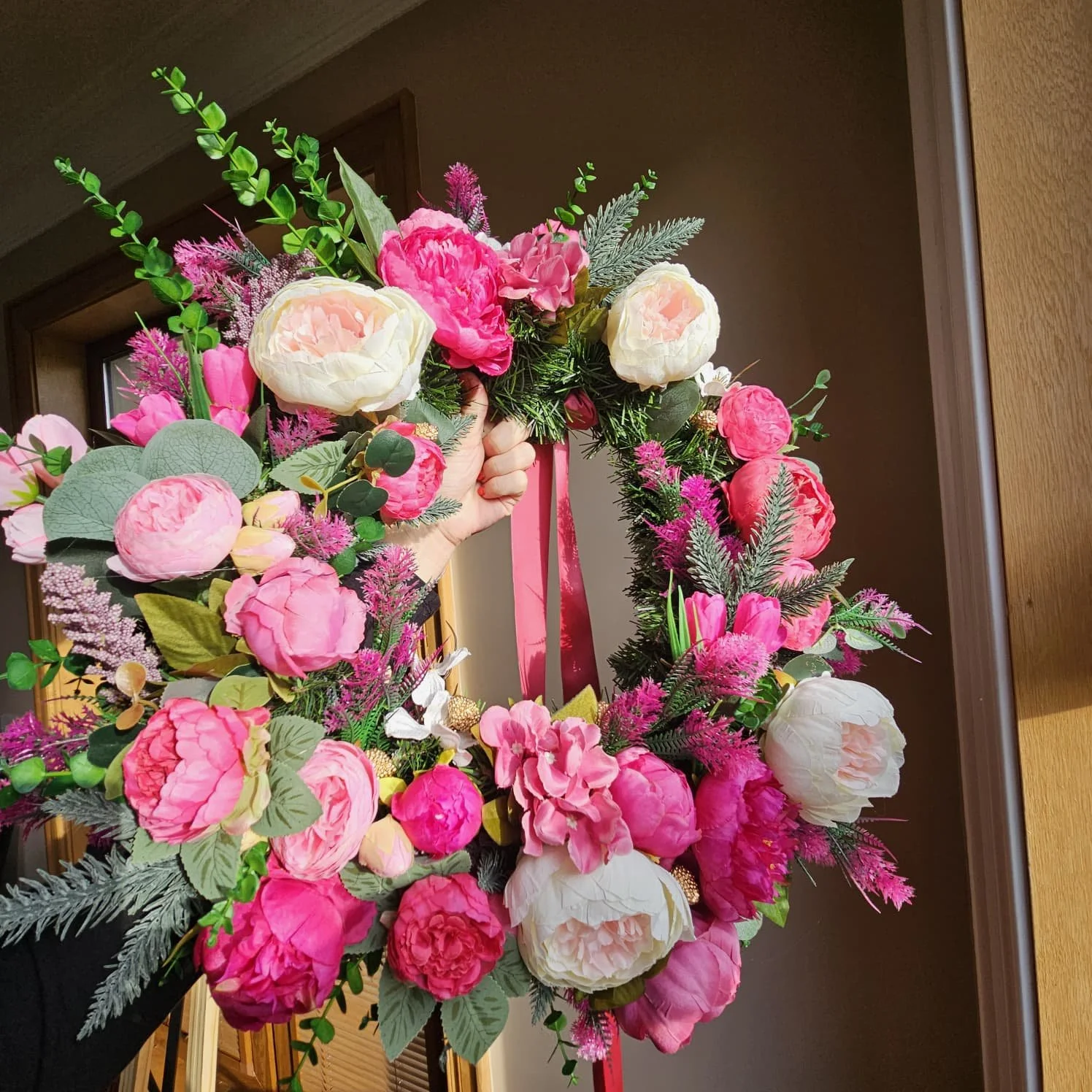 Pink Parade hanging up by window 8.jpeg