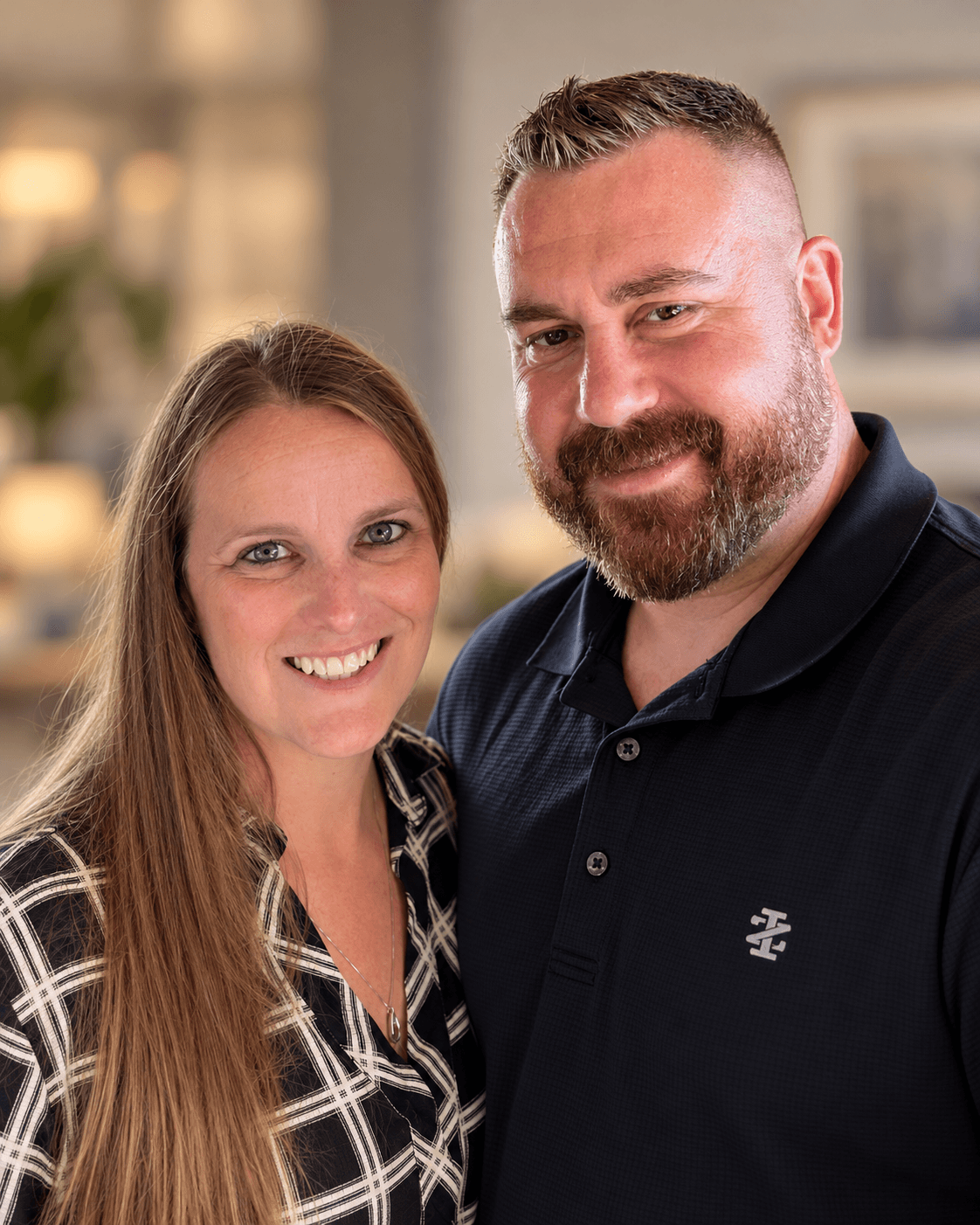 Jennifer and Joseph Martin of Ascension Healings posing together indoors