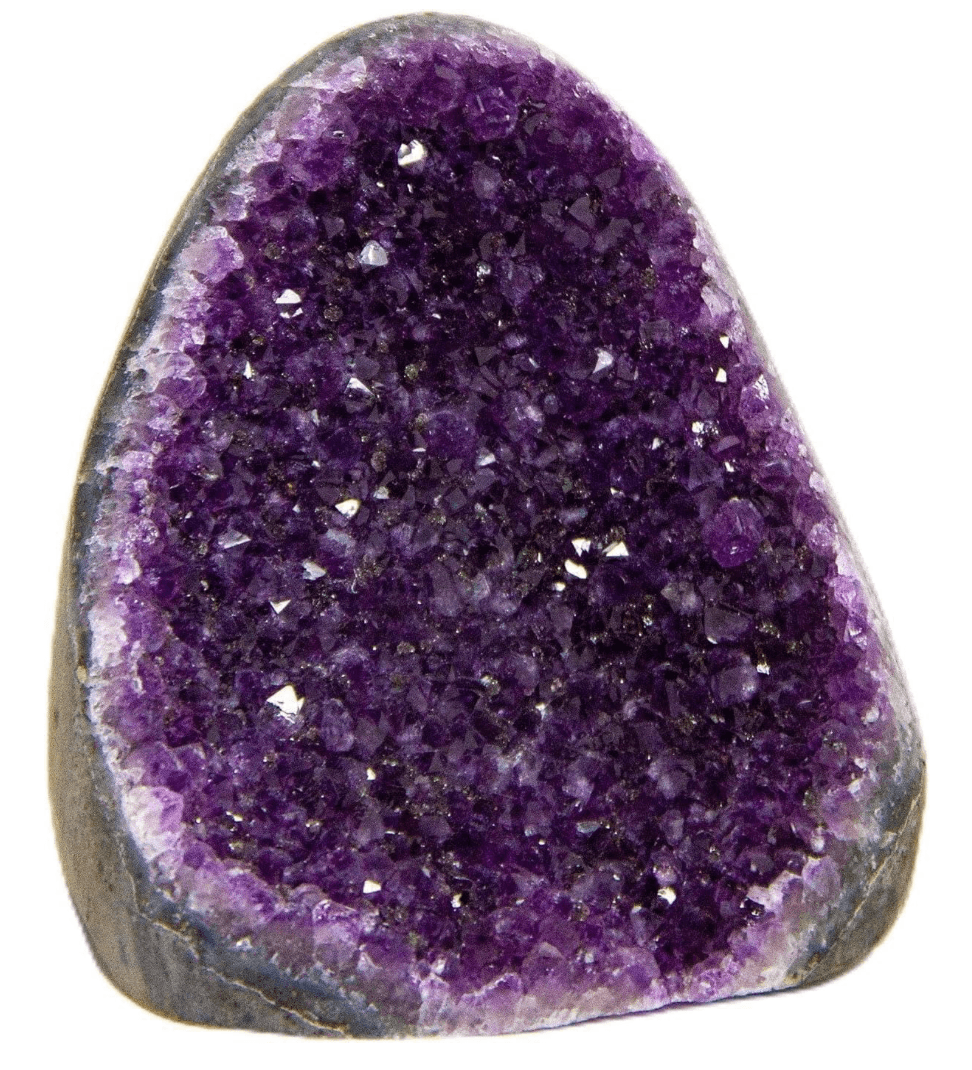 A close-up of a purple geode with sparkling crystals inside.