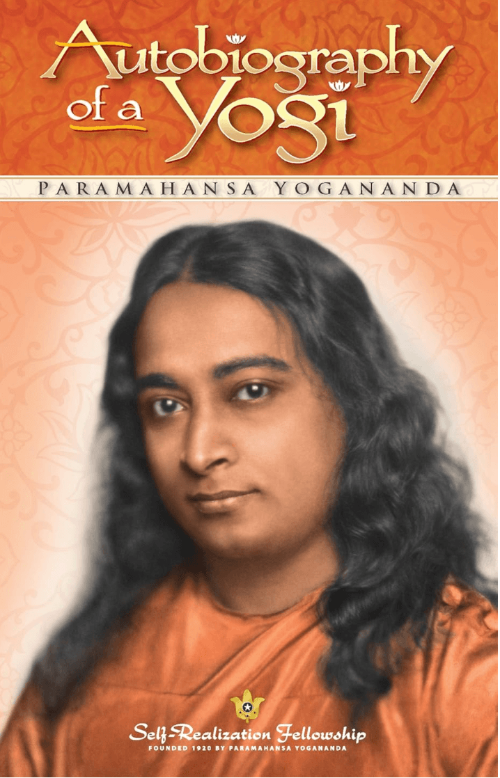Book cover titled 'Autobiography of a Yogi' by Paramahansa Yogananda, featuring a portrait of Paramahansa Yogananda in orange robes with long black hair, and the text 'Self-Realization Fellowship, Founded 1920 by Paramahansa Yogananda' at the bottom.