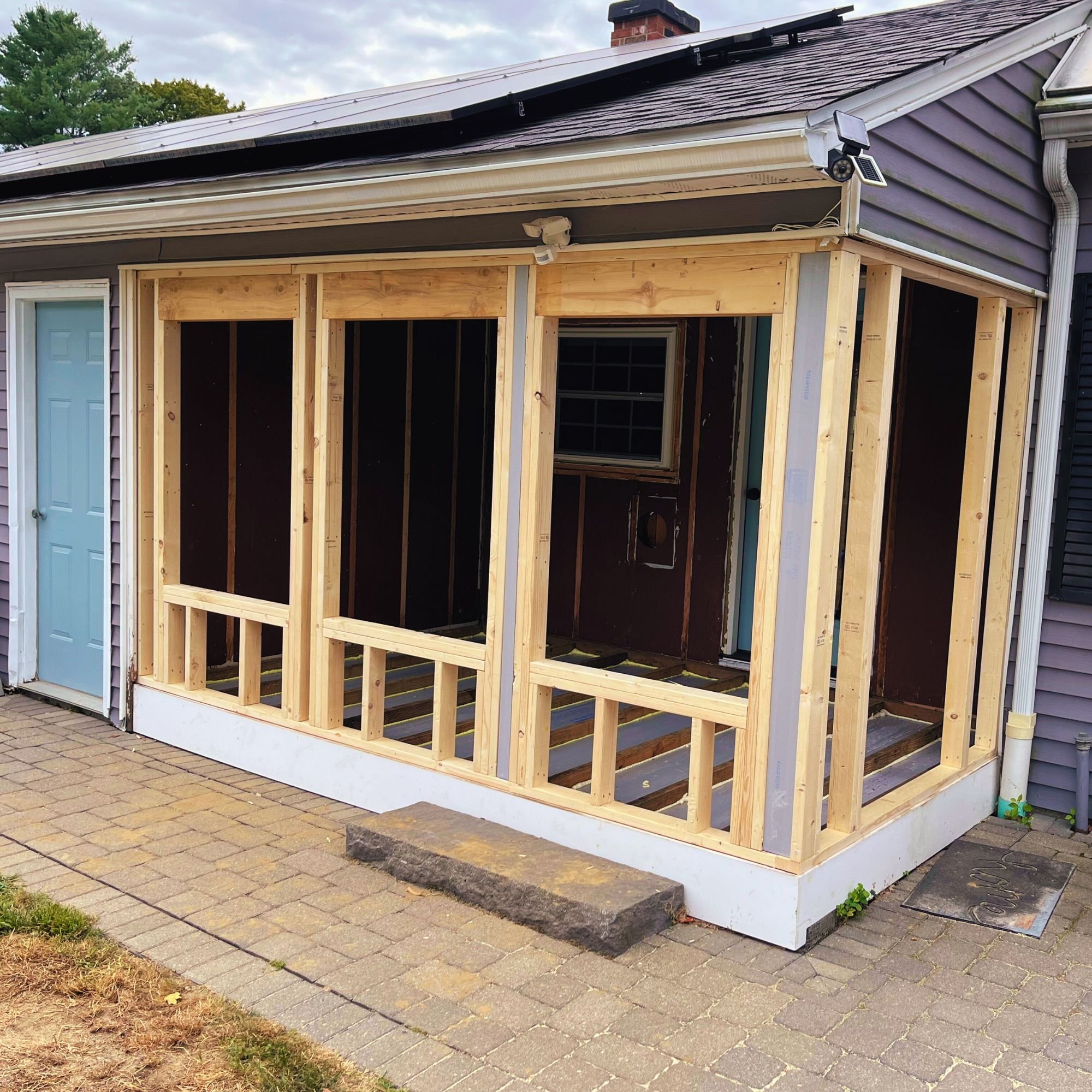 Porch enclosure in progress on private home in Western Massachusetts - Wisewood Craft Carpentry.