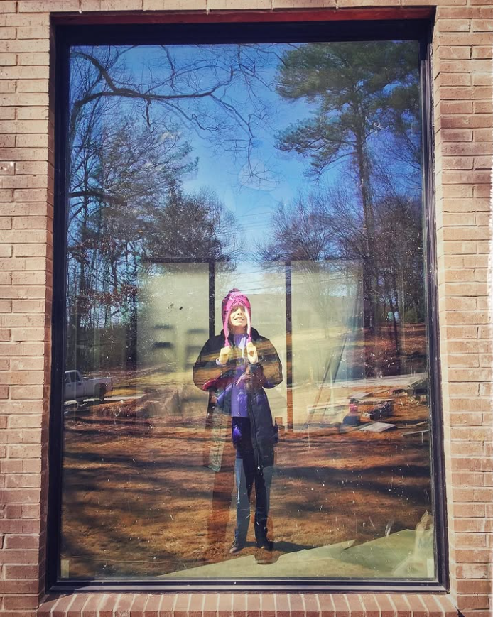 little girl in window