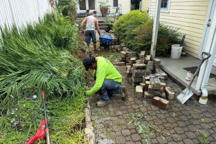 Crew rebuilding retaining wall and preparing foundation near home in Manchester, TN.