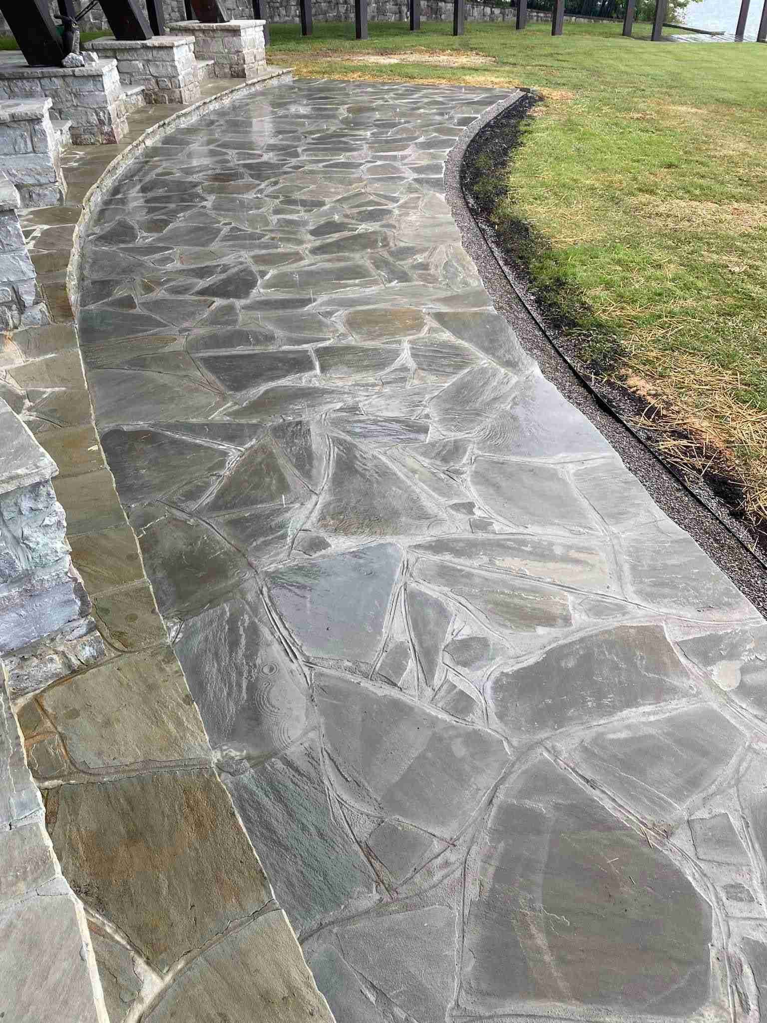 Stamped concrete patio with stone pattern finish installed for residential hardscape project in Middle Tennessee