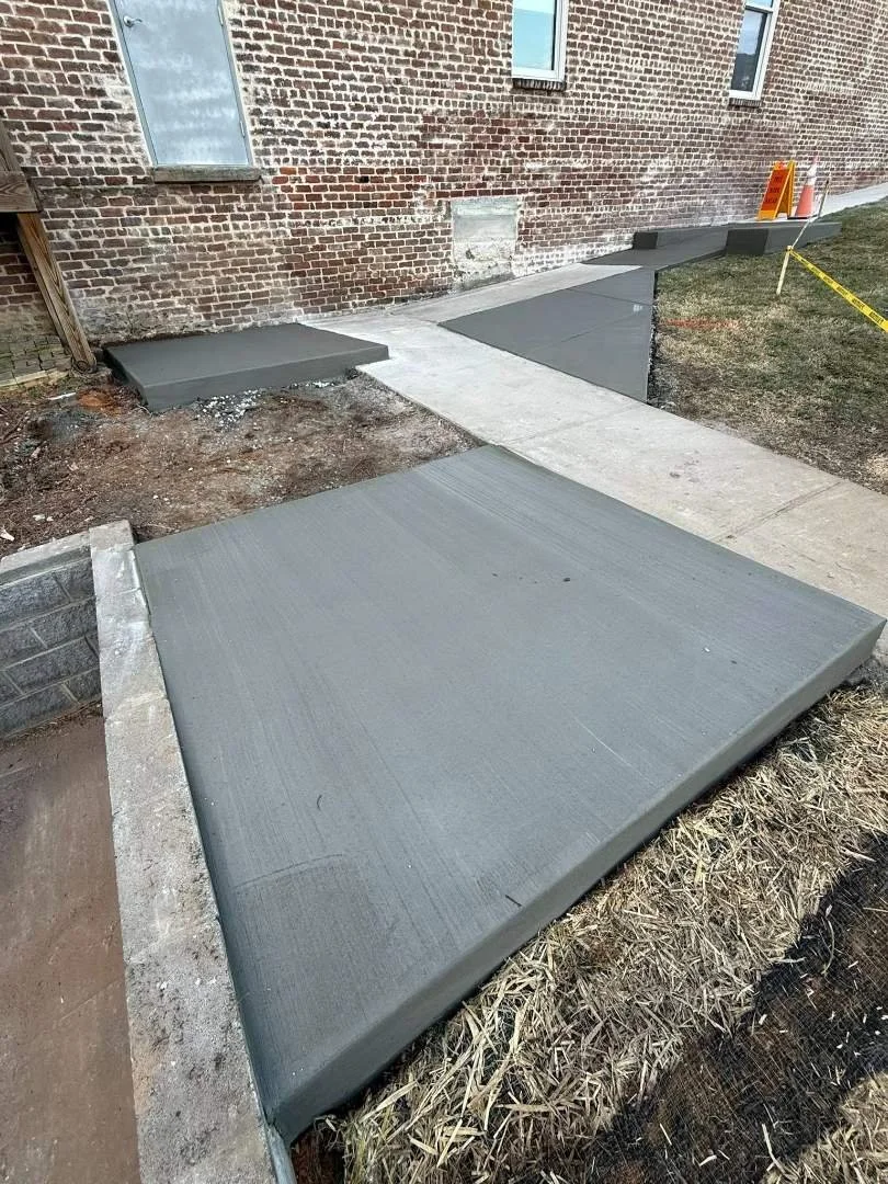 Finished concrete landing and sidewalk transition at Panther Creek Forestry in McMinnville, TN