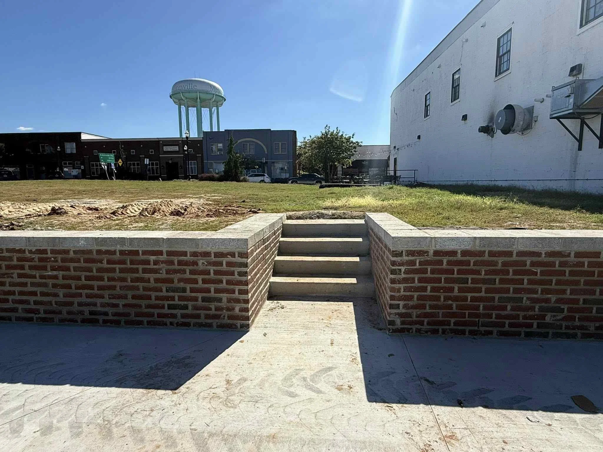 Brick retaining wall and concrete steps installed as part of downtown McMinnville hardscape projec