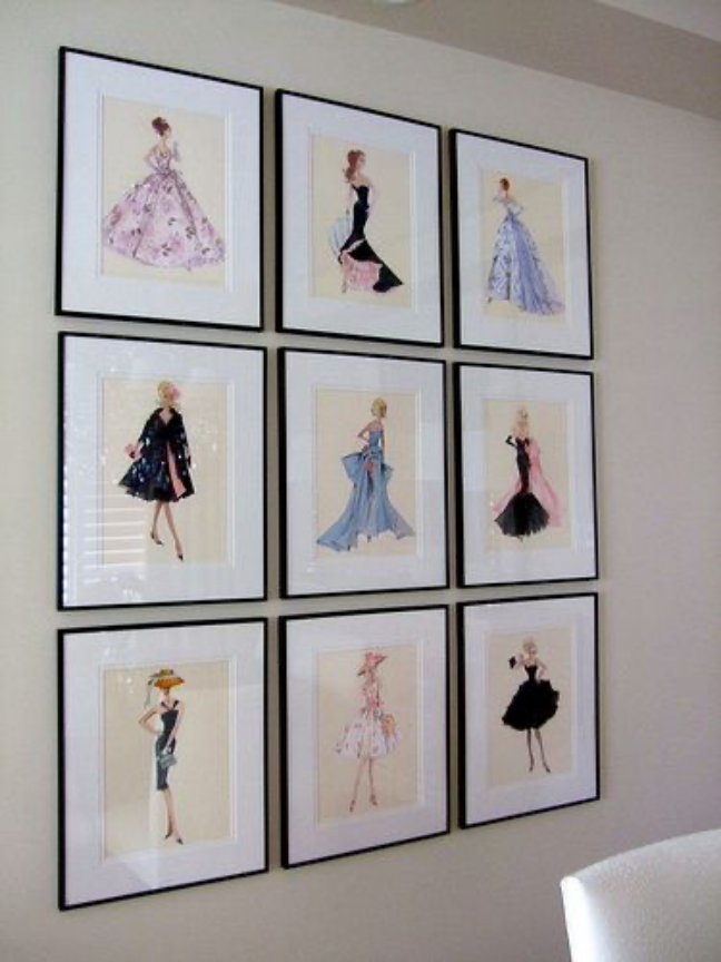Gallery wall of colorful fashion illustrations.