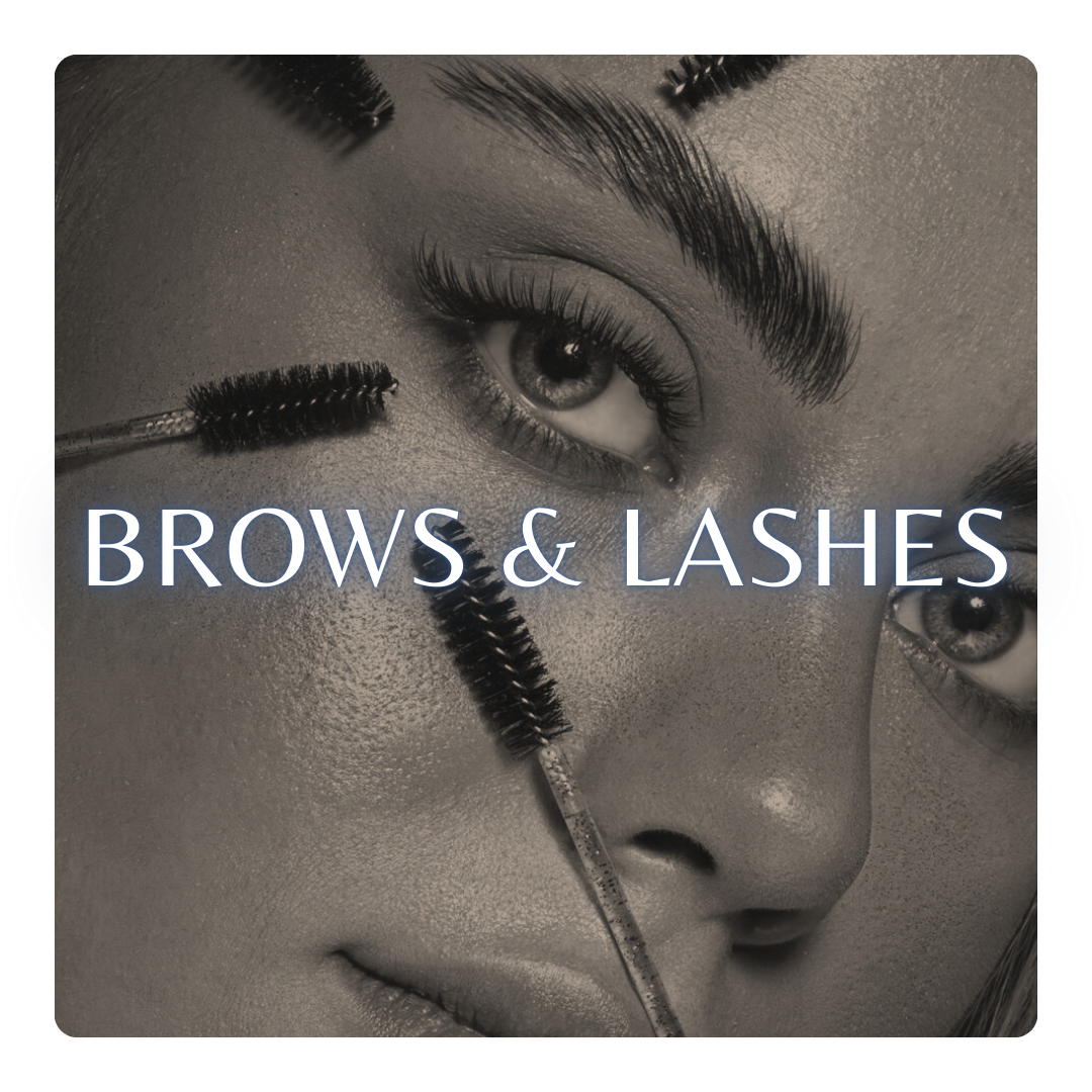 Close-up of a woman's face with mascara wands near her eye, with the text 'BROWS & LASHES' overlaying the image.