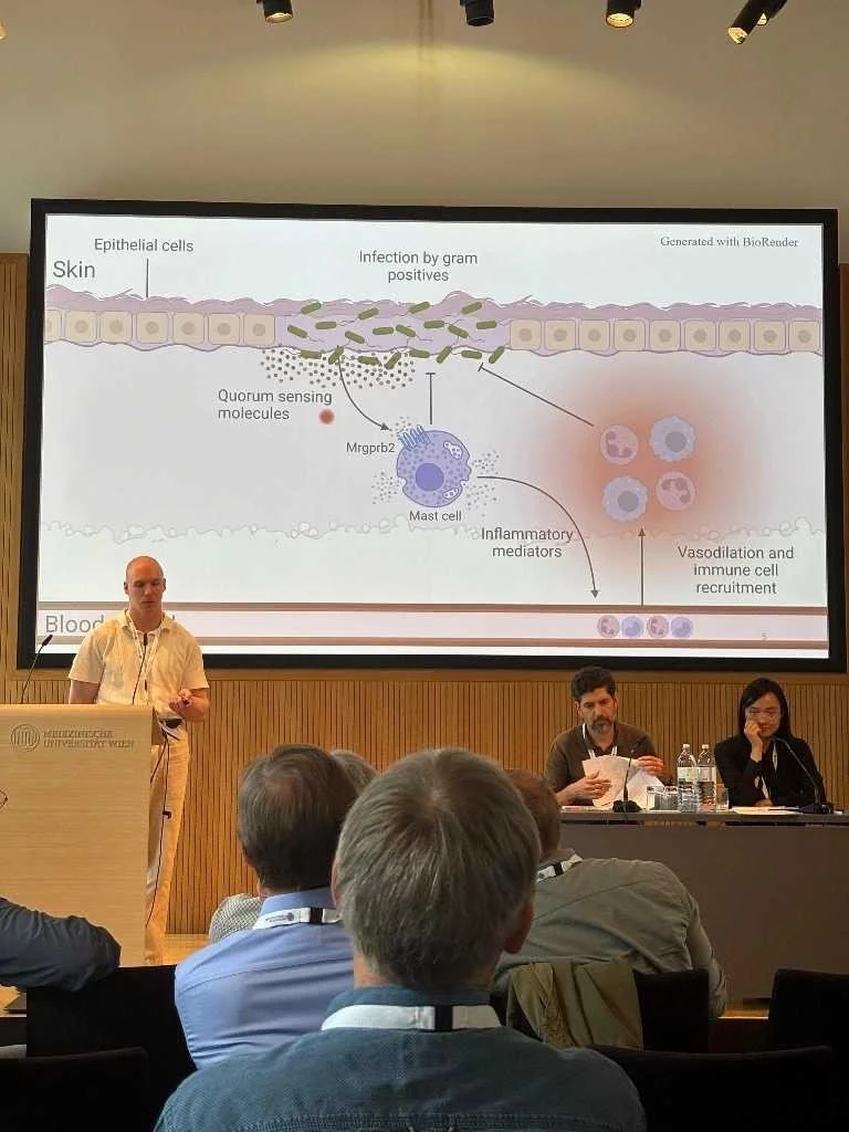 Colin presenting his research at the EMBRN Meeting in Vienna, June 2026