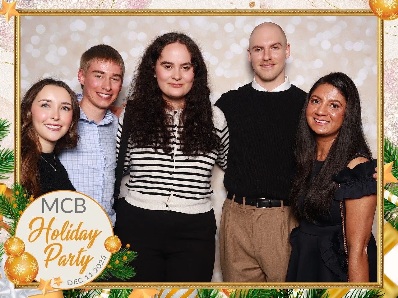 The lab group at the departmental holiday party, 2025