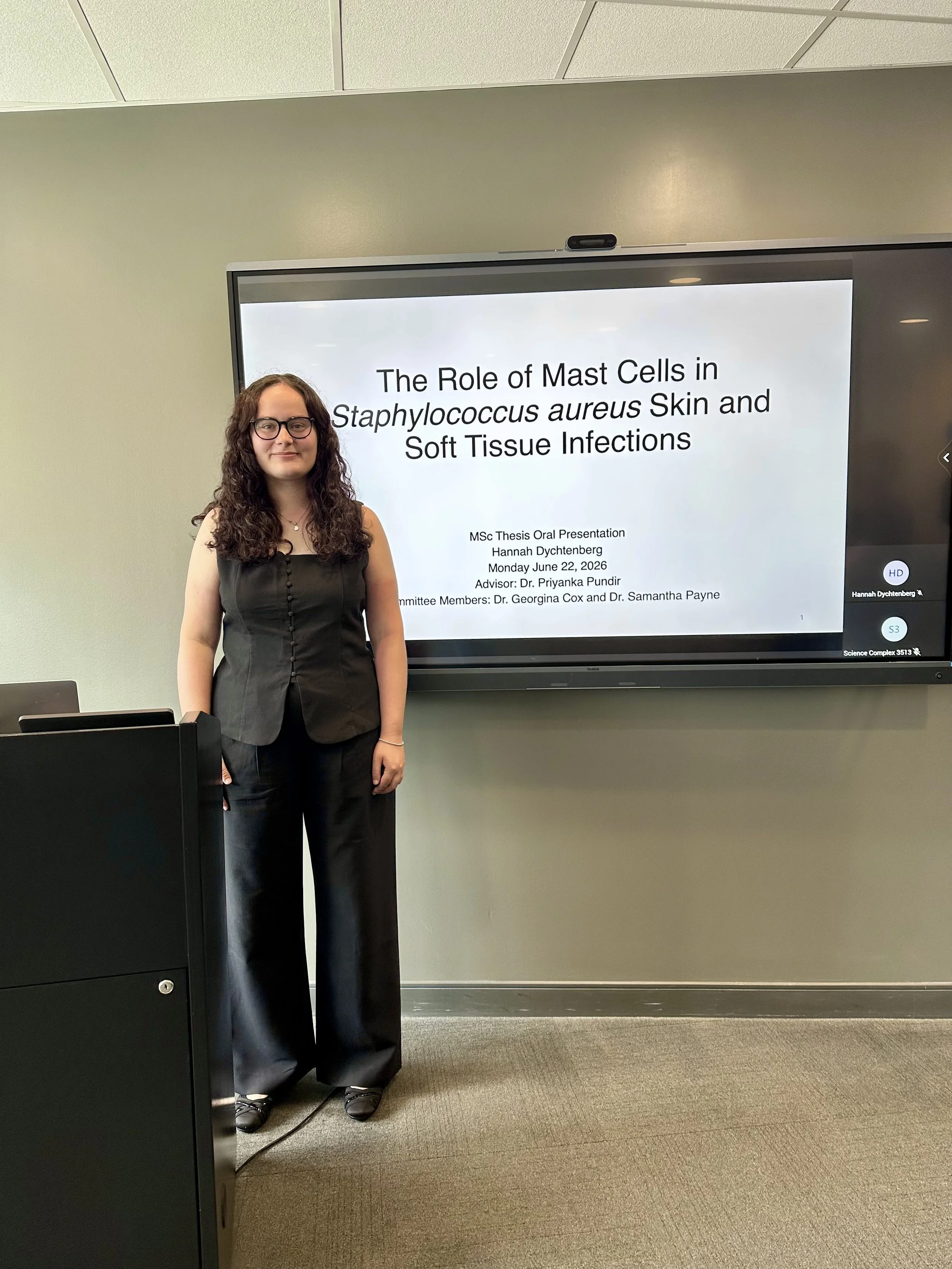Hannah successfully defending her MSc thesis, June 2026