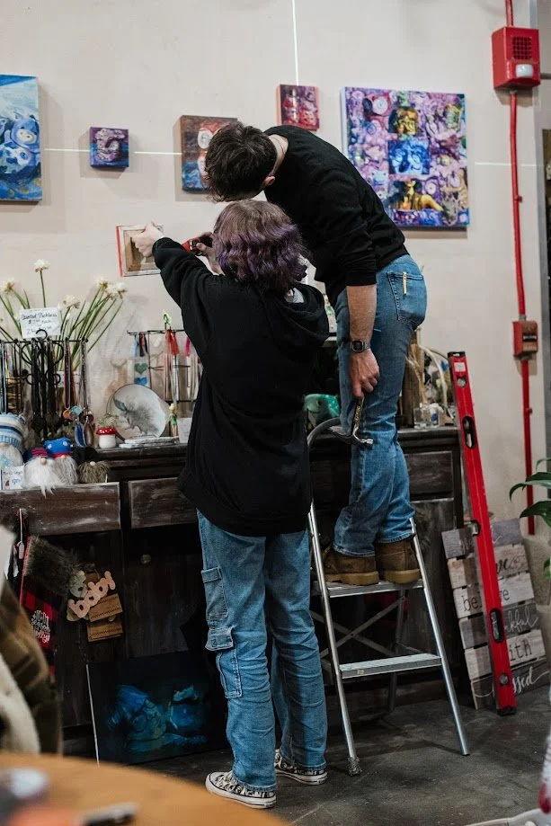 Behind Her Lenses- Solo Show. Showcased Artist, Art Installer. Terri’s Flower Shop, Naugatuck CT.