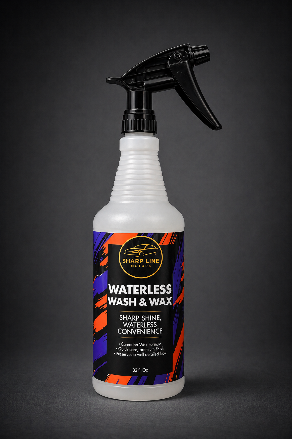 A spray bottle of waterless car wash and wax with a black and orange label, black spray nozzle, and white bottle, set against a dark background.