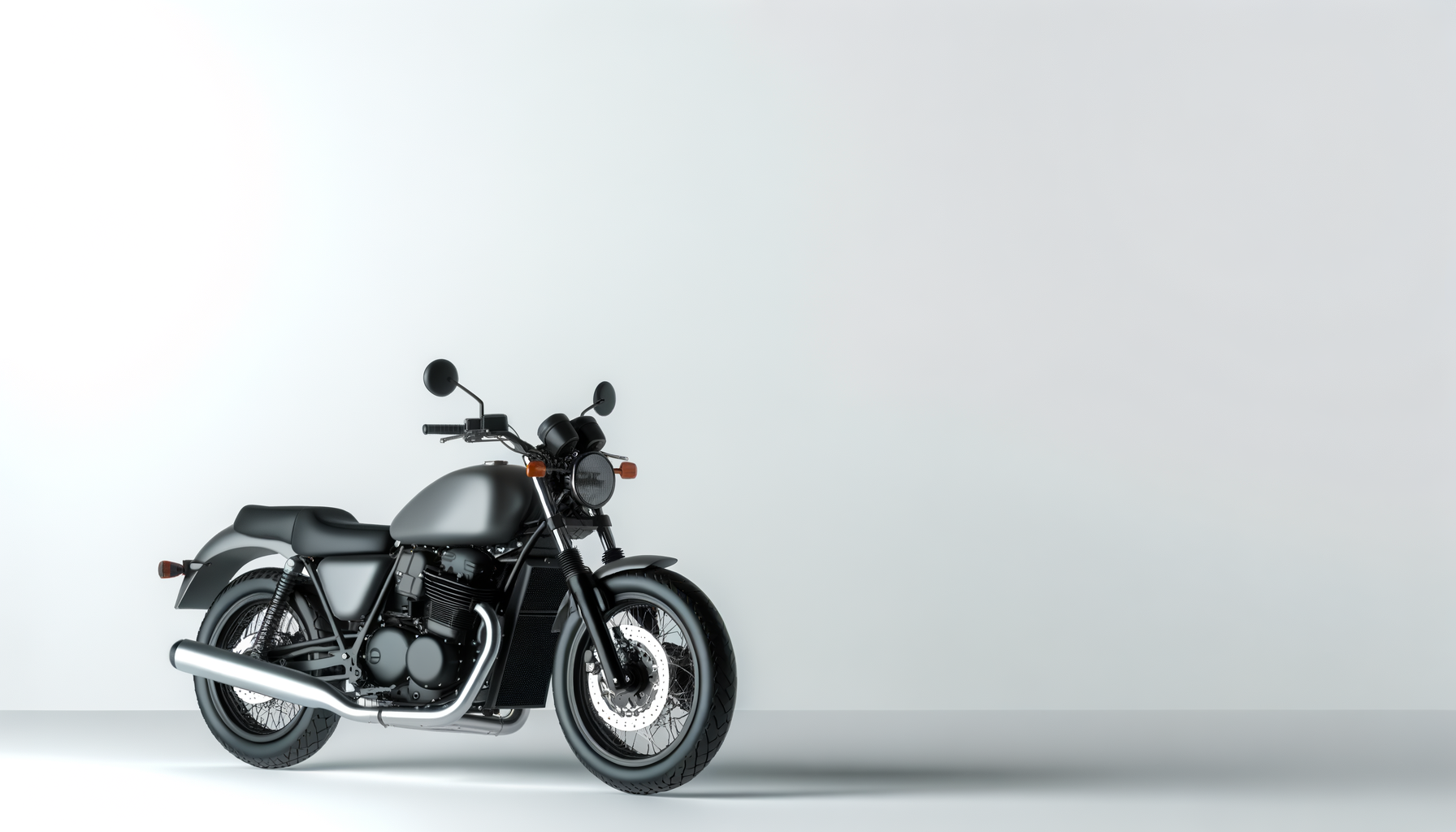Black motorcycle with matte finish parked against plain light gray background.