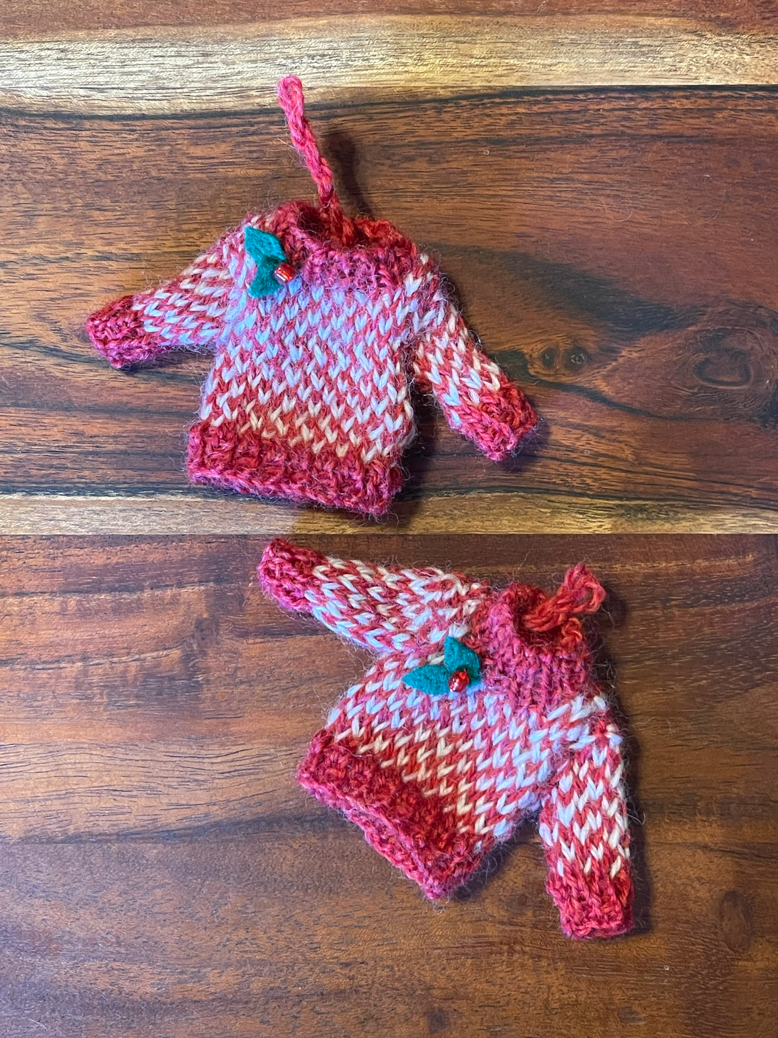 Hand-knit miniature holiday sweater ornaments, designed and made by Sara Trotter / Chroma Maison Design.