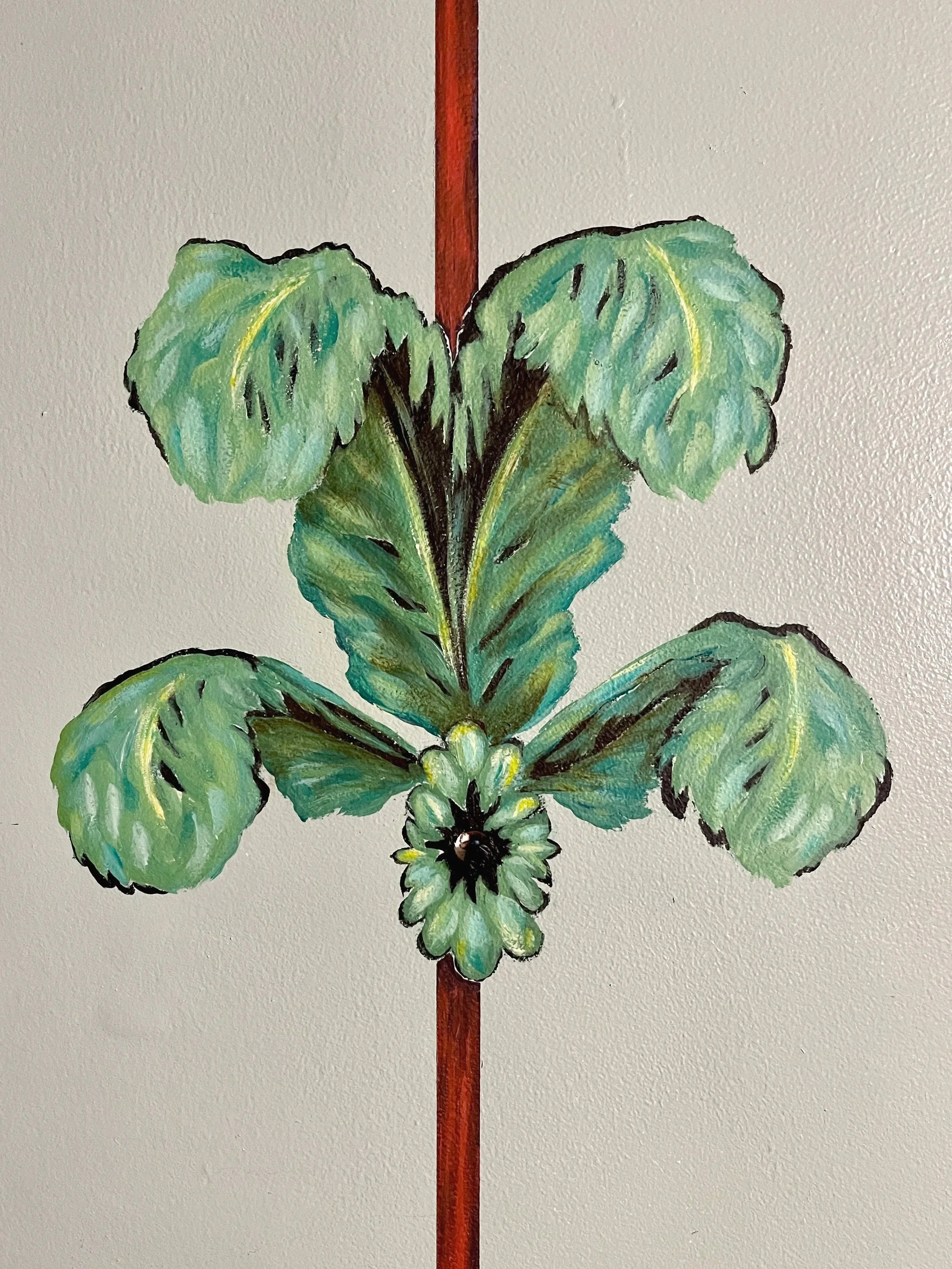 Detail of a hand-painted mural feather wall ornament, by Sara Trotter / Chroma Maison Design.