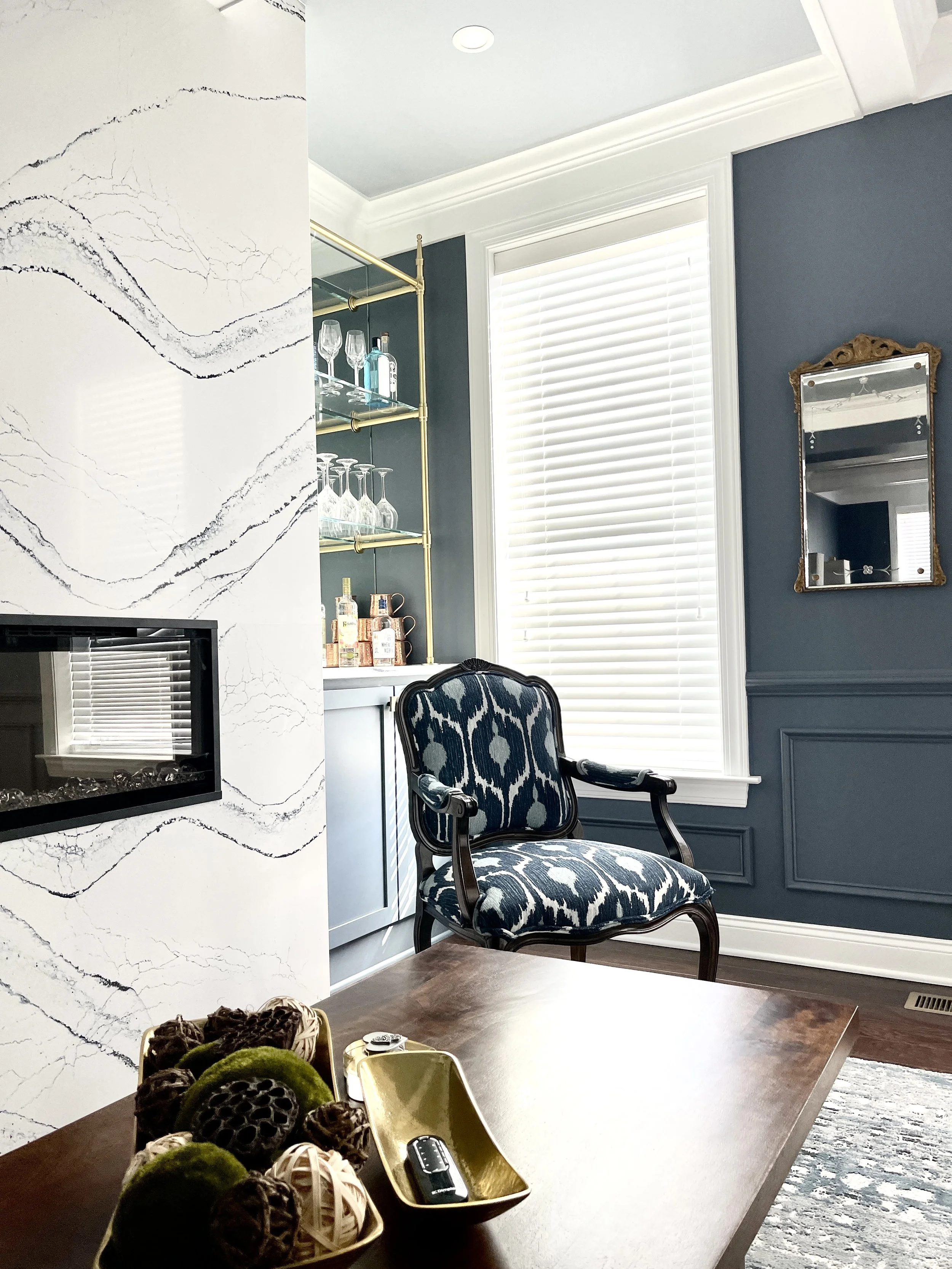 Cambria Portrush quartz fireplace with Granite Peak painted walls.  Custom paint plan and photography by Sara Trotter / Chroma Maison Design.