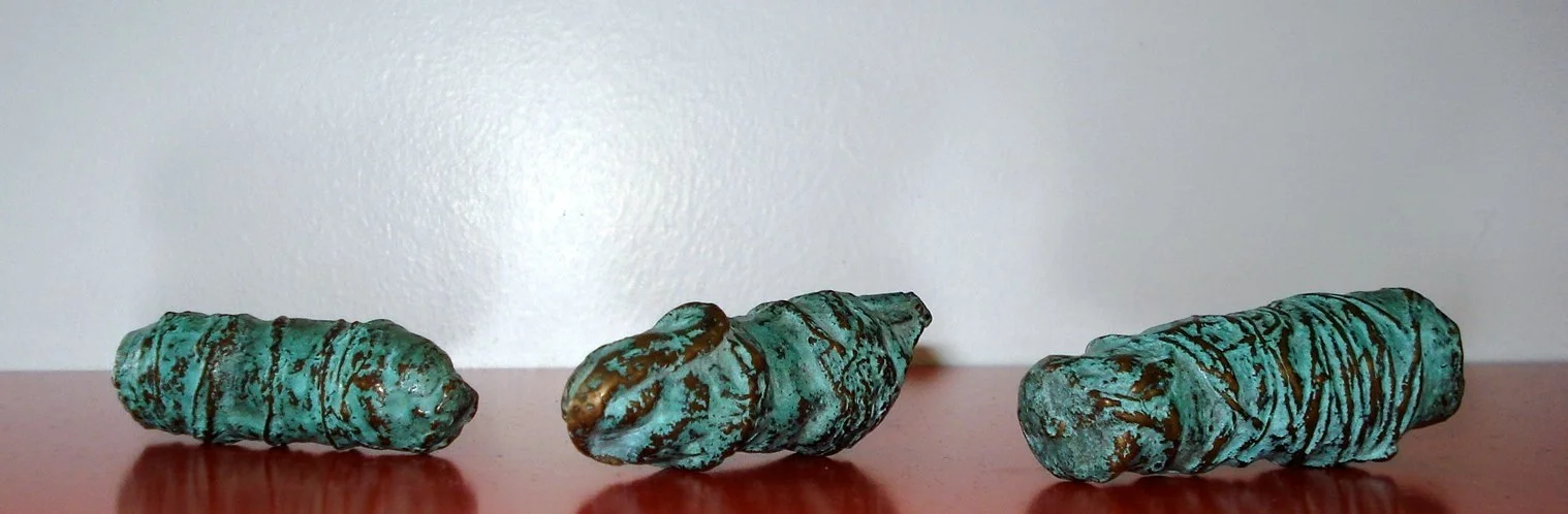 LITTLE GREENS.  1998. Bronze 6cm x 2cm