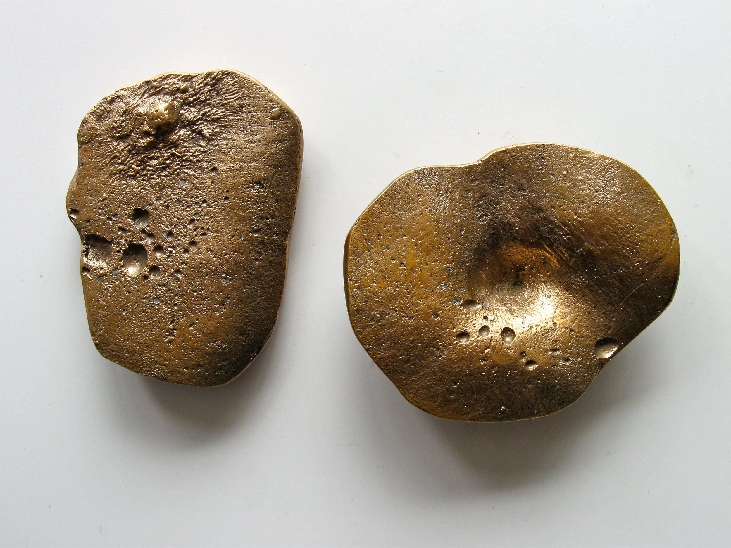 NAVEL AND NIPPLE. 1999. Bronze 
10cm x 8cm, 
9cm x 7cm