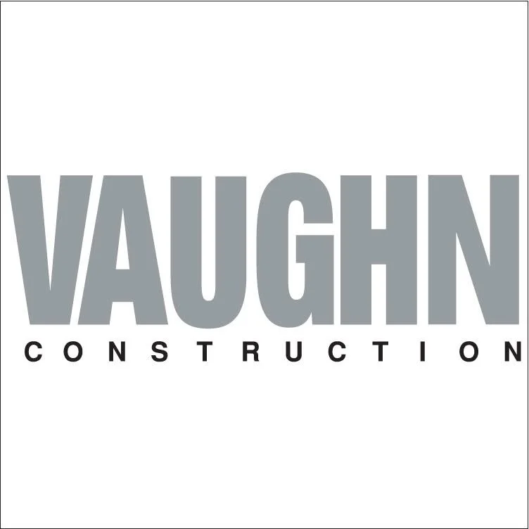 Vaughn Construction company logo in gray and black text.