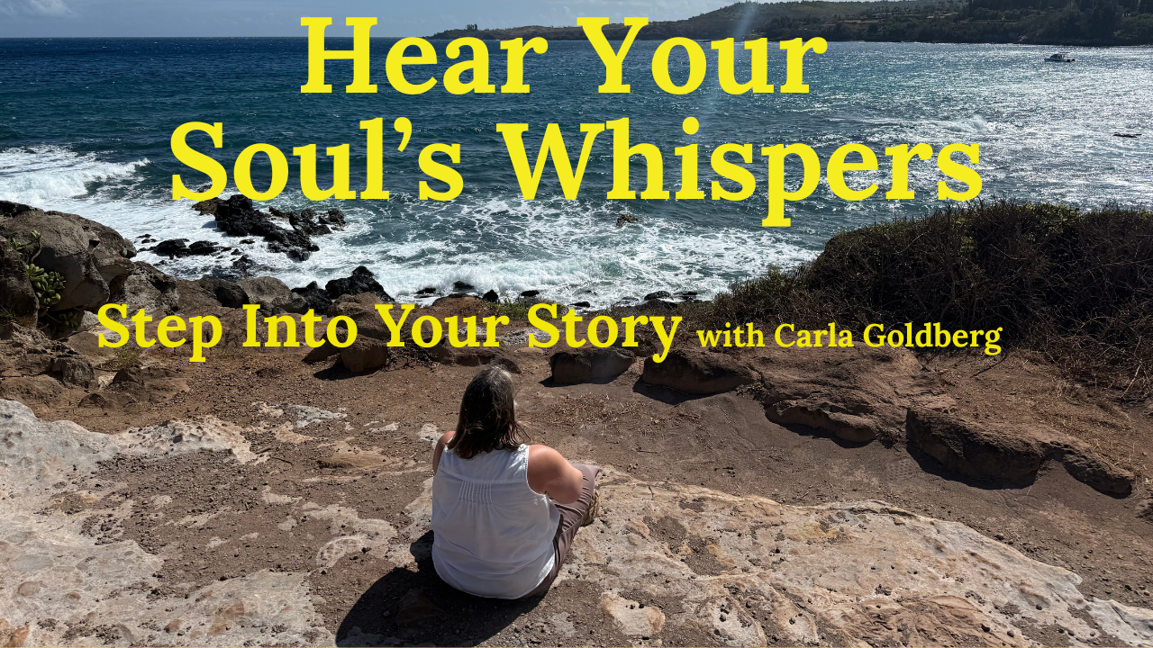 A woman sitting on rocks by the ocean, facing the water, with trees in the background. Overlaid text reads: 'Hear Your Soul's Whispers. Step Into Your Story with Carla Goldberg.'