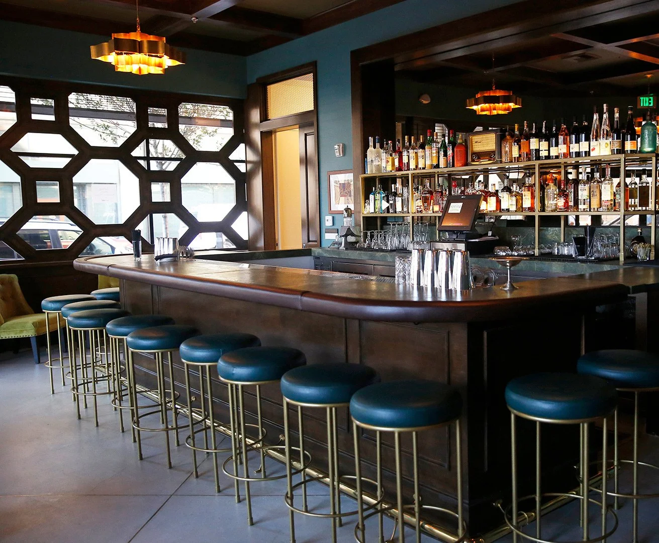 Architecture of Spring restaurant, DTLA, inside bar with blue and brass seating