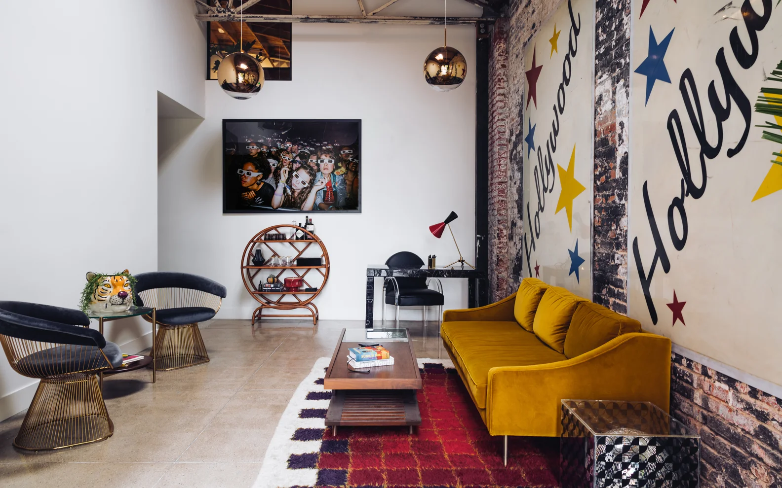 Architecture for Gold Diggers Sound recording studio in East Hollywood, lounge area with original brick wall