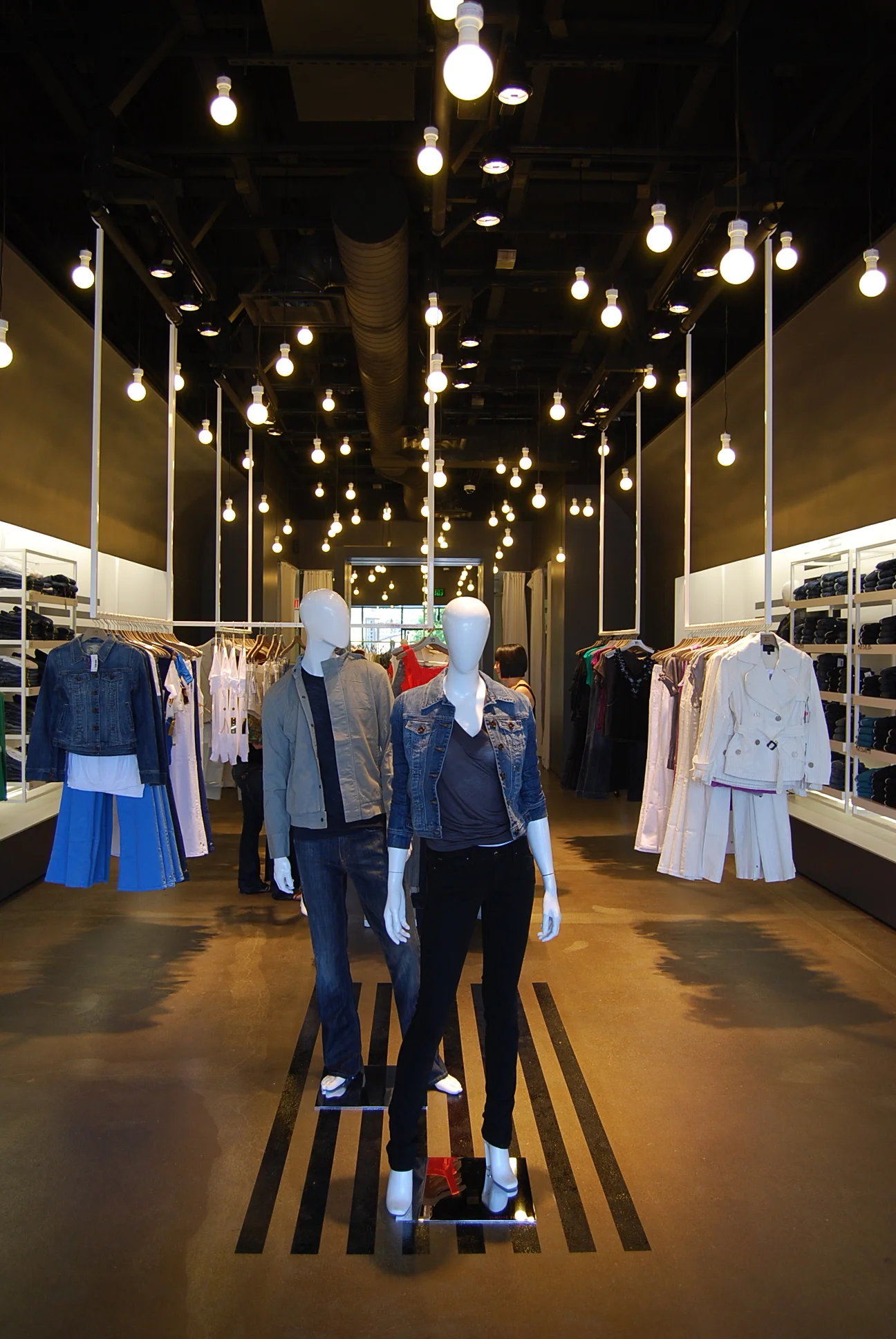 Architecture for Joe's Jeans retail outlet stores, clothing displays and racks