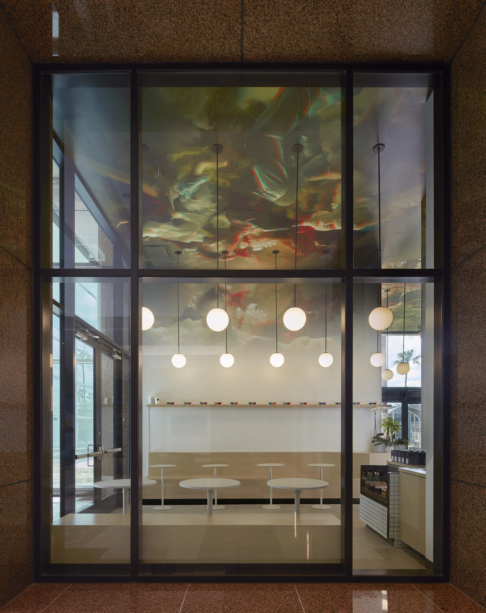 Architecture of Stereoscope Coffee in Newport Beach, seating and steel framed panels