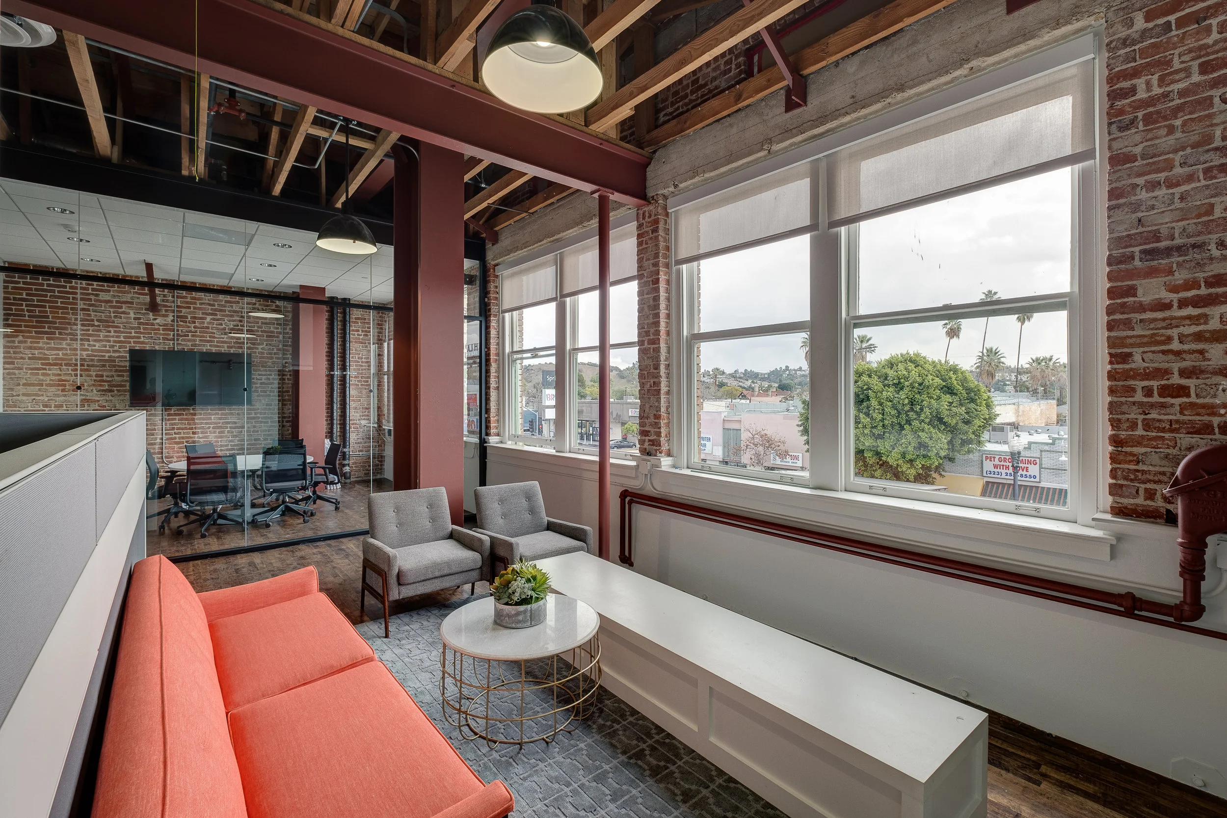 Architecture and renovation of Frank's Building in Highland Park, tenant improvement for open plan studio office, lounge area