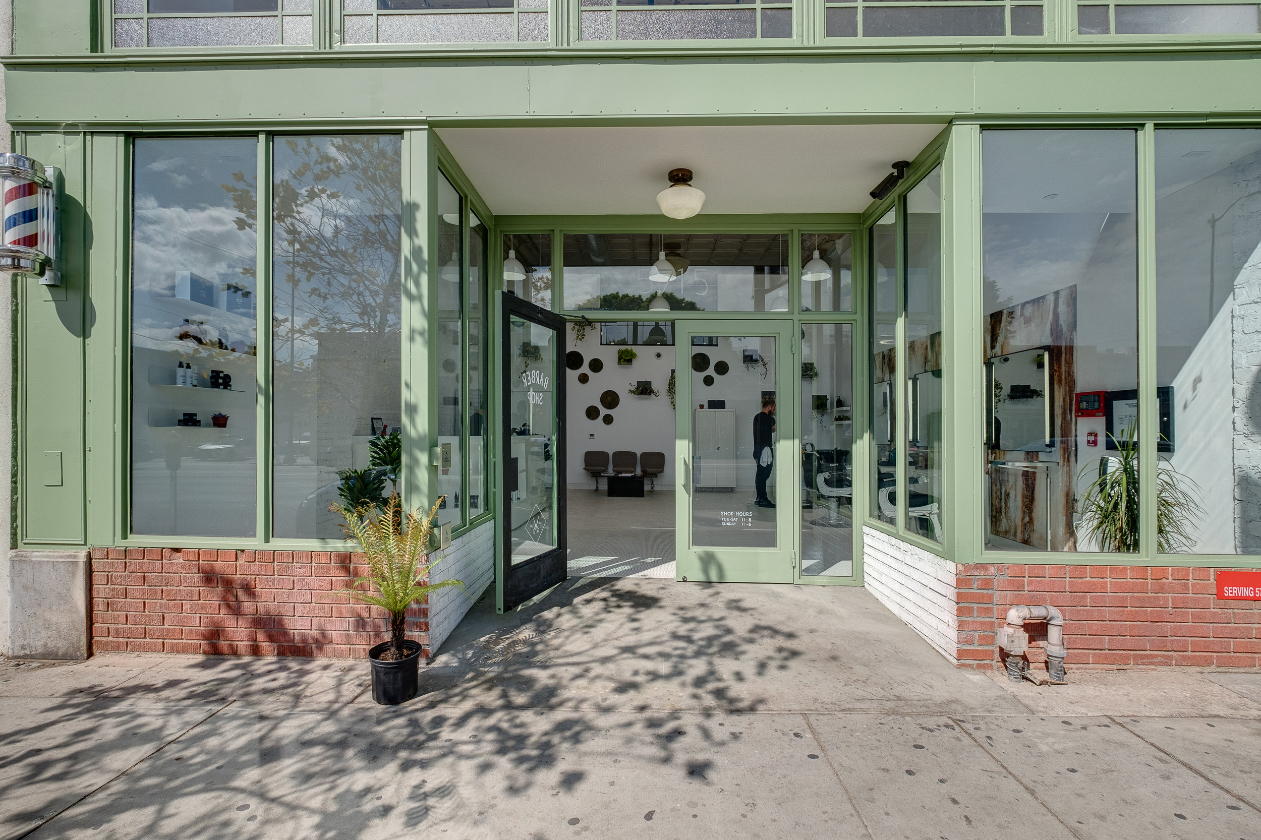 Architecture and renovation of Frank's Building in Highland Park, entry to Blind Barber tenant