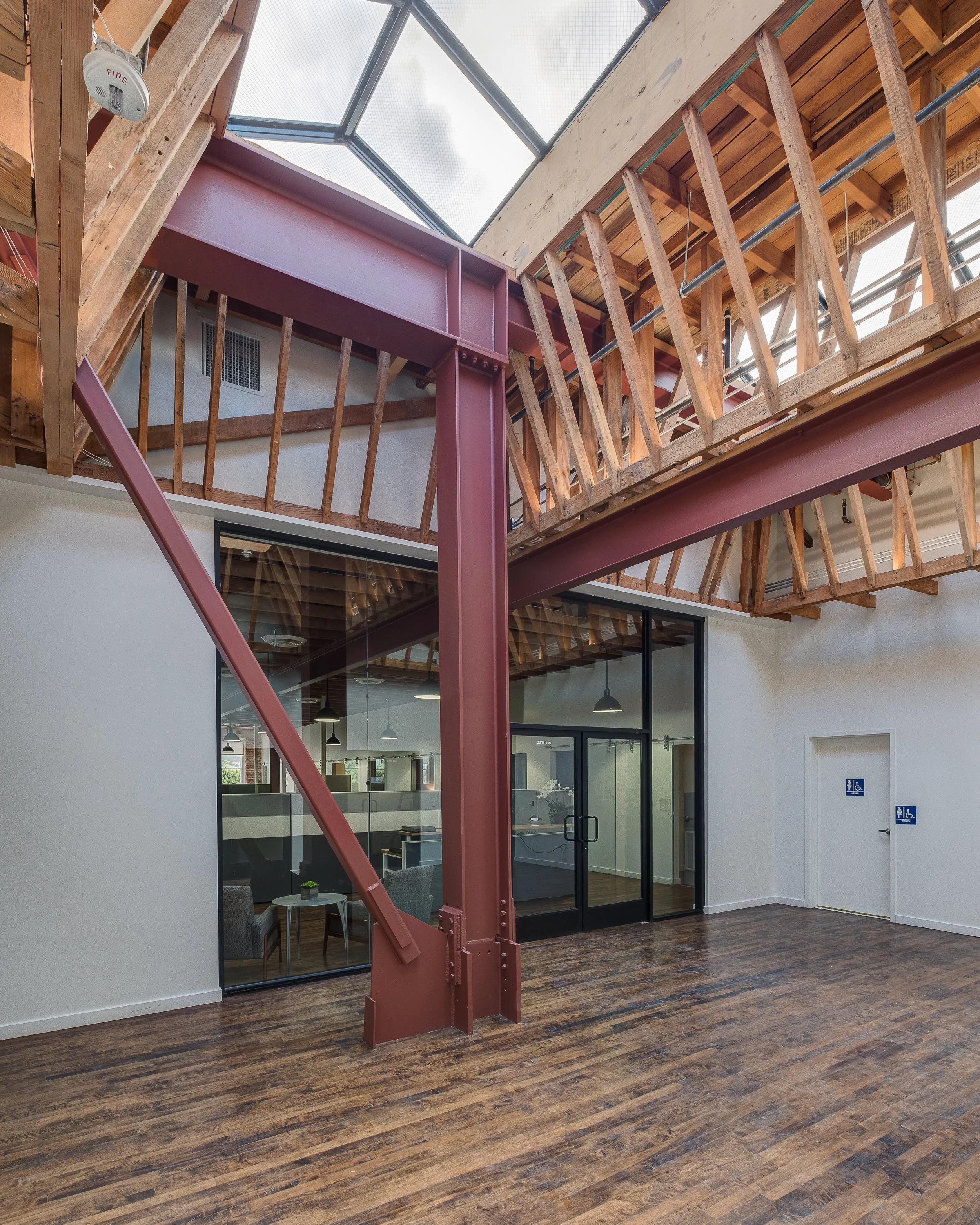 Architecture and renovation of Frank's Building in Highland Park, tenant improvement for open plan studio office, interior entry