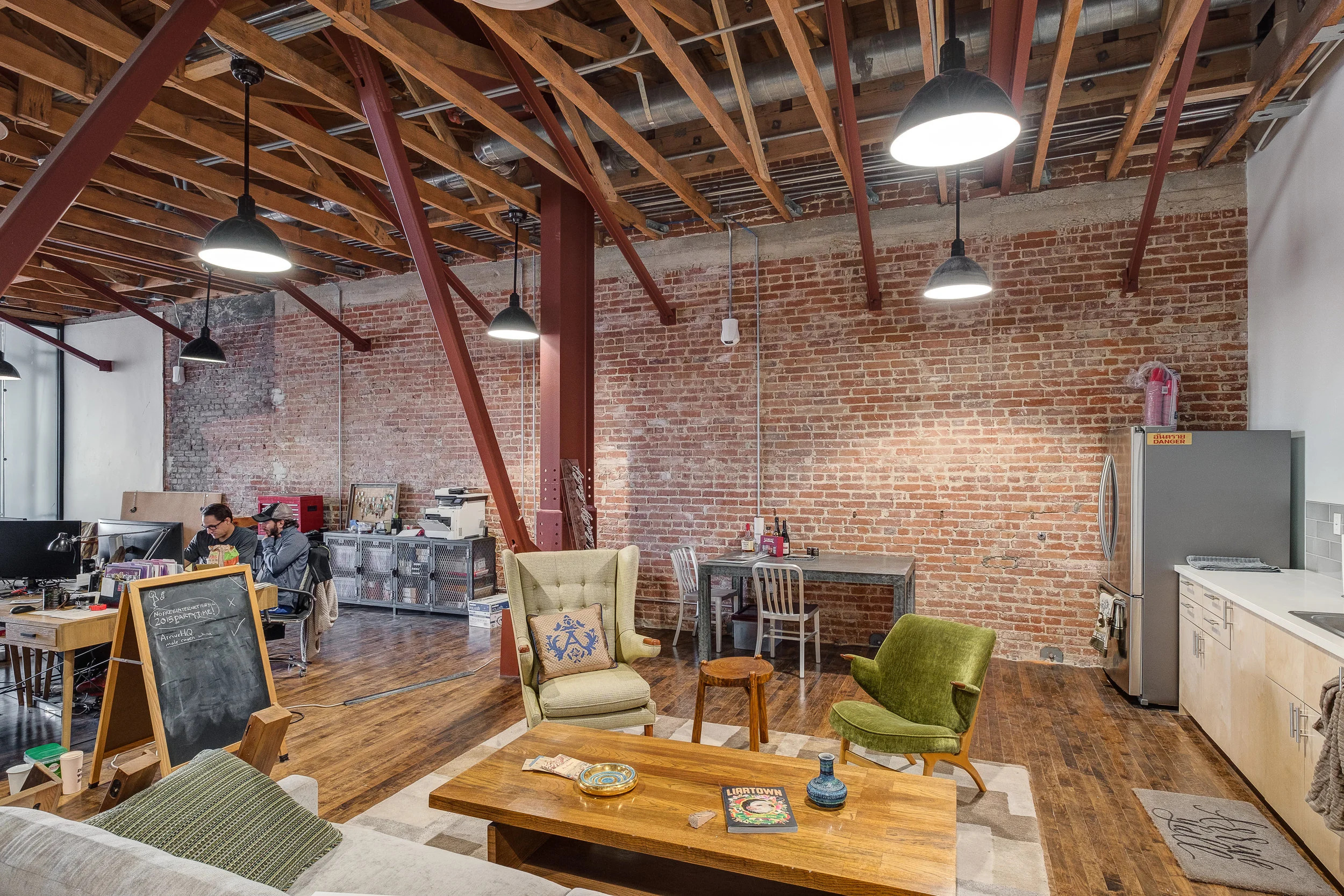 Architecture and renovation of Frank's Building in Highland Park, tenant improvement for open plan studio office, meeting lounge area