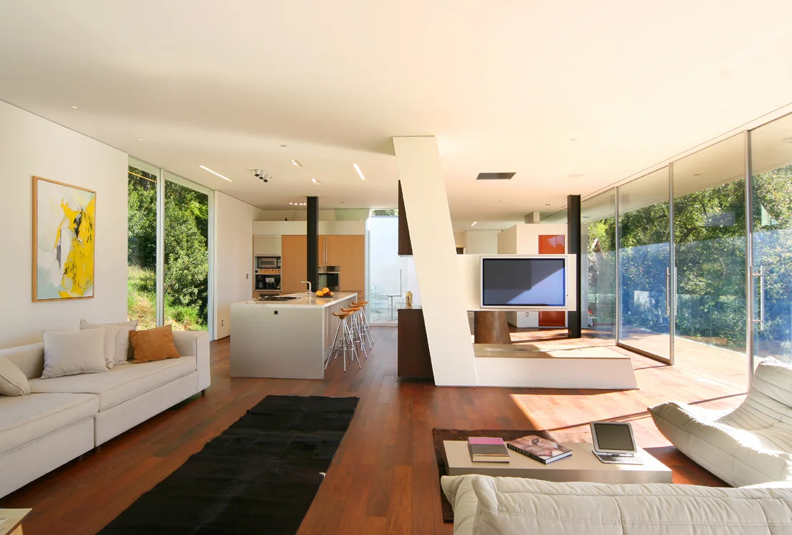 Architecture and design of residence designed to protect trees and to maximize views and breezes in Benedict Canyon. Open floor plan.