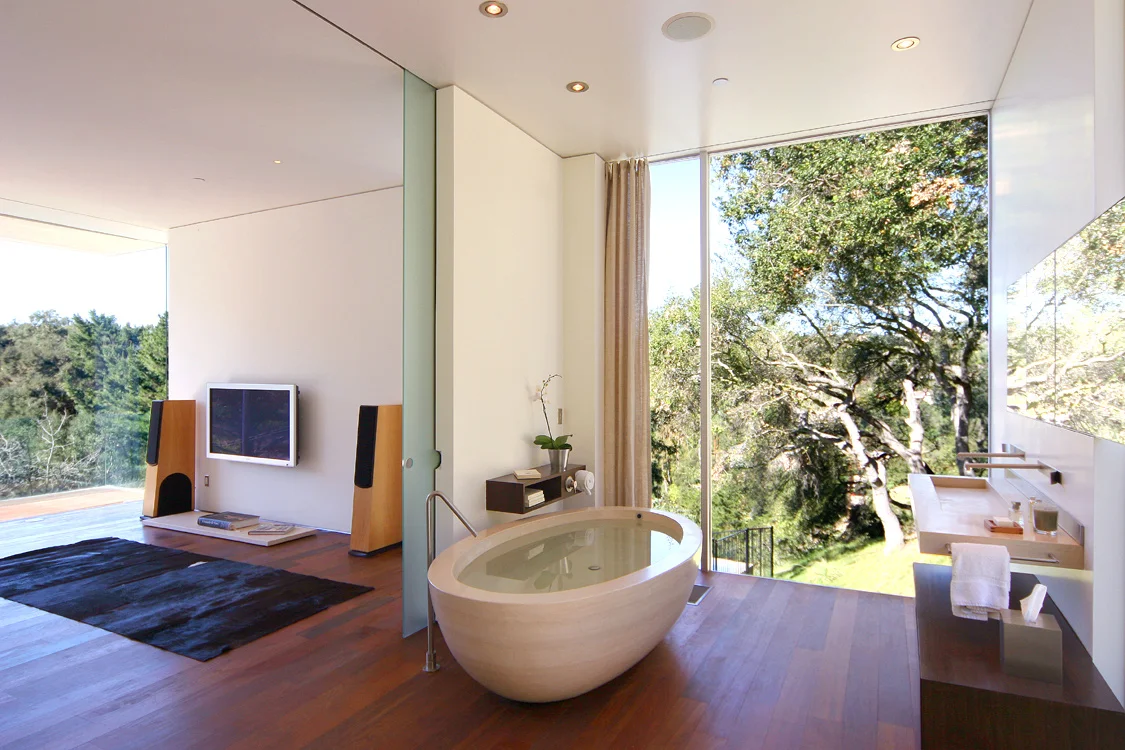Architecture and design of residence designed to protect trees and to maximize views and breezes in Benedict Canyon. Bathroom.
