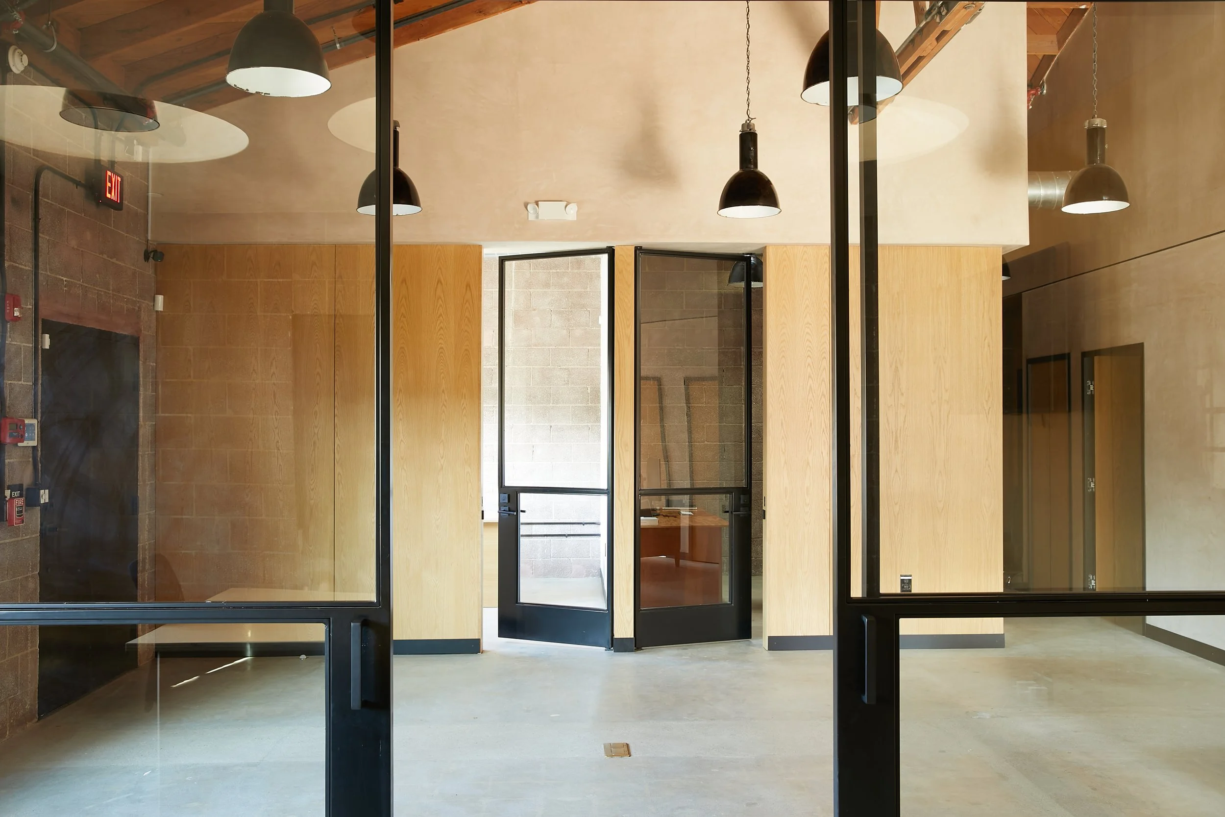 Architecture and design for Lazy Eye office, CMU renovation in Frogtown, black details
