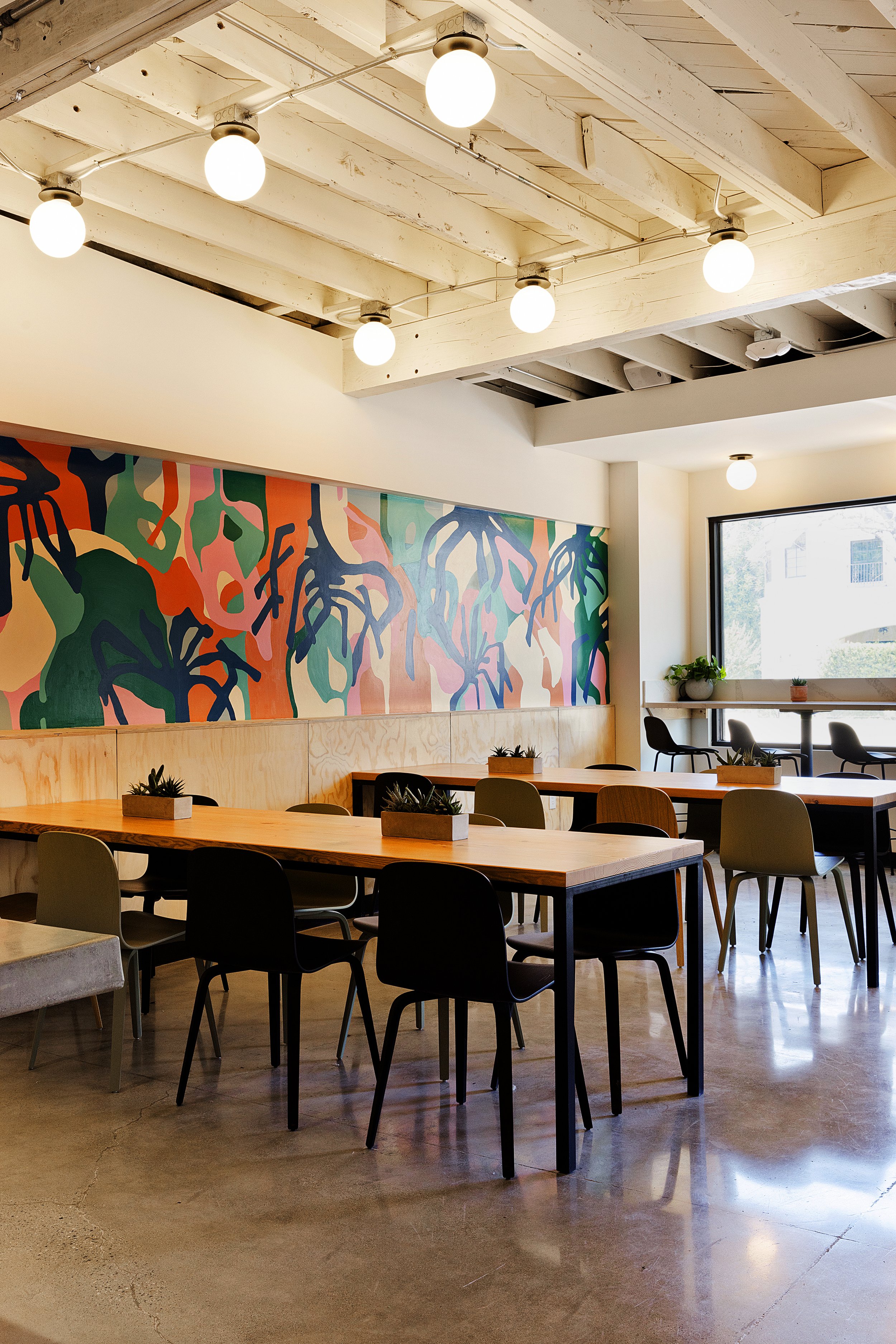 Architecture of Seabirds Kitchen restaurant in Los Feliz, seating and wall mural art