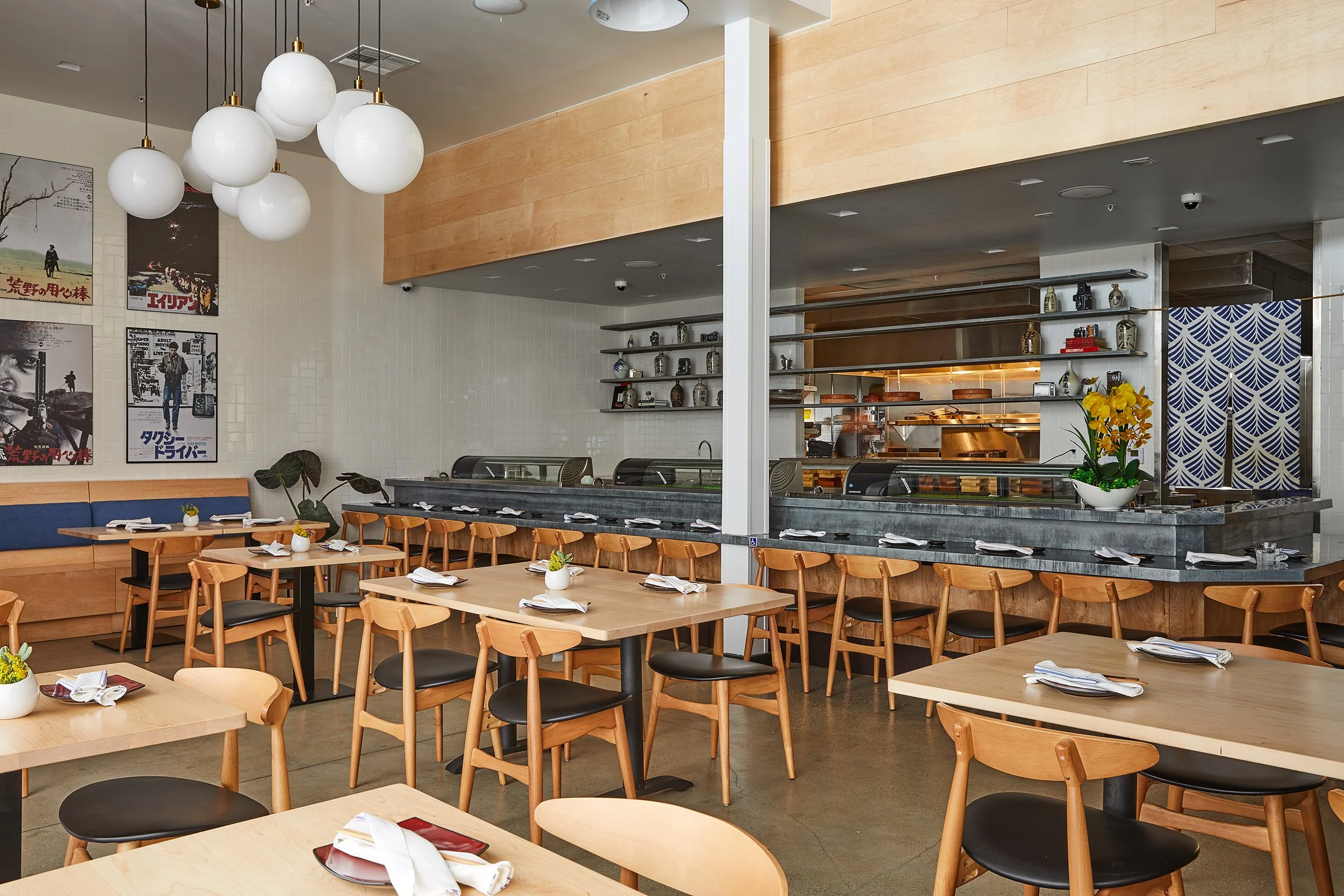 Architecture of Sake Dojo restaurant Little Tokyo, seating and sushi bar