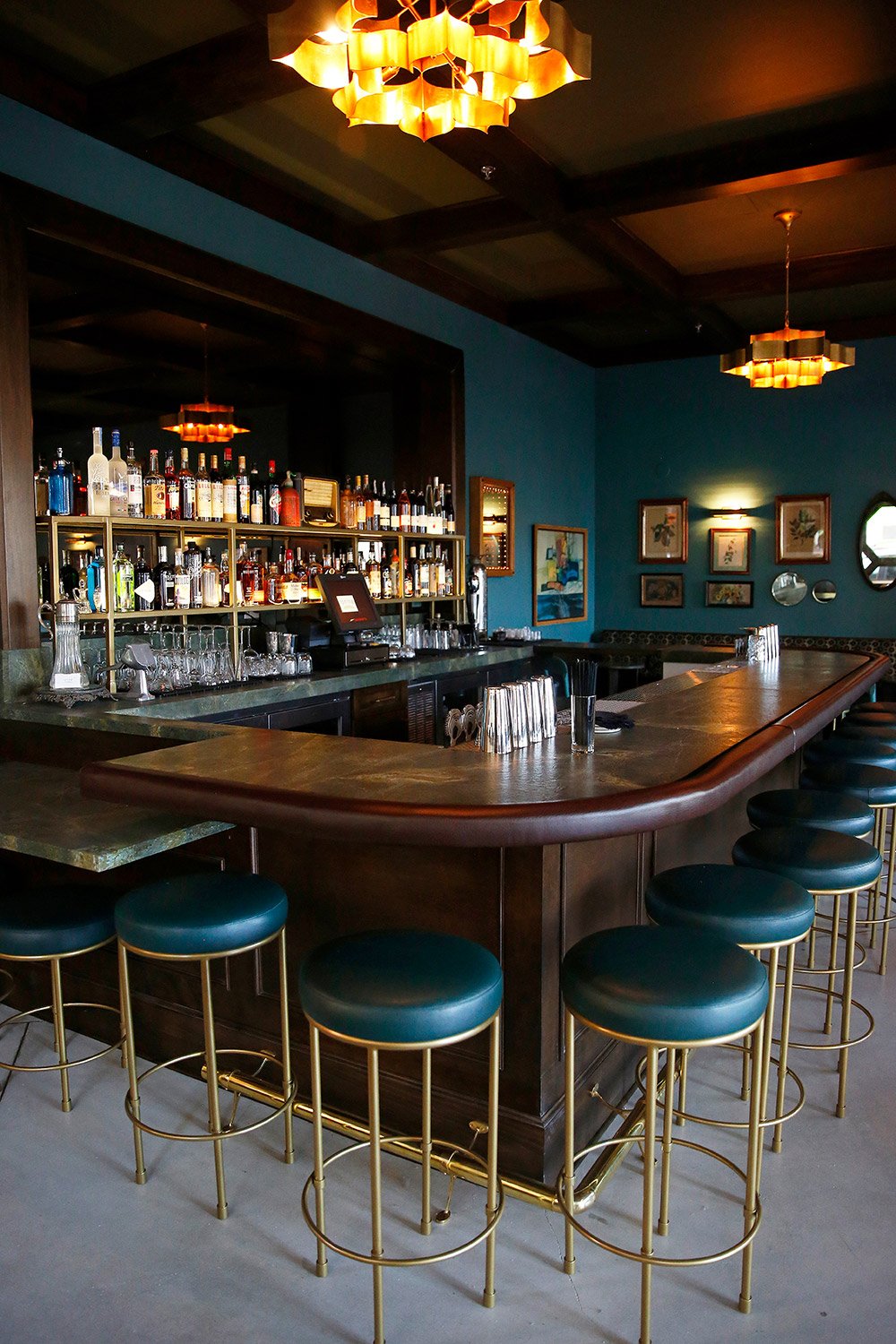 Architecture of Spring restaurant, DTLA, inside bar with blue and brass seating