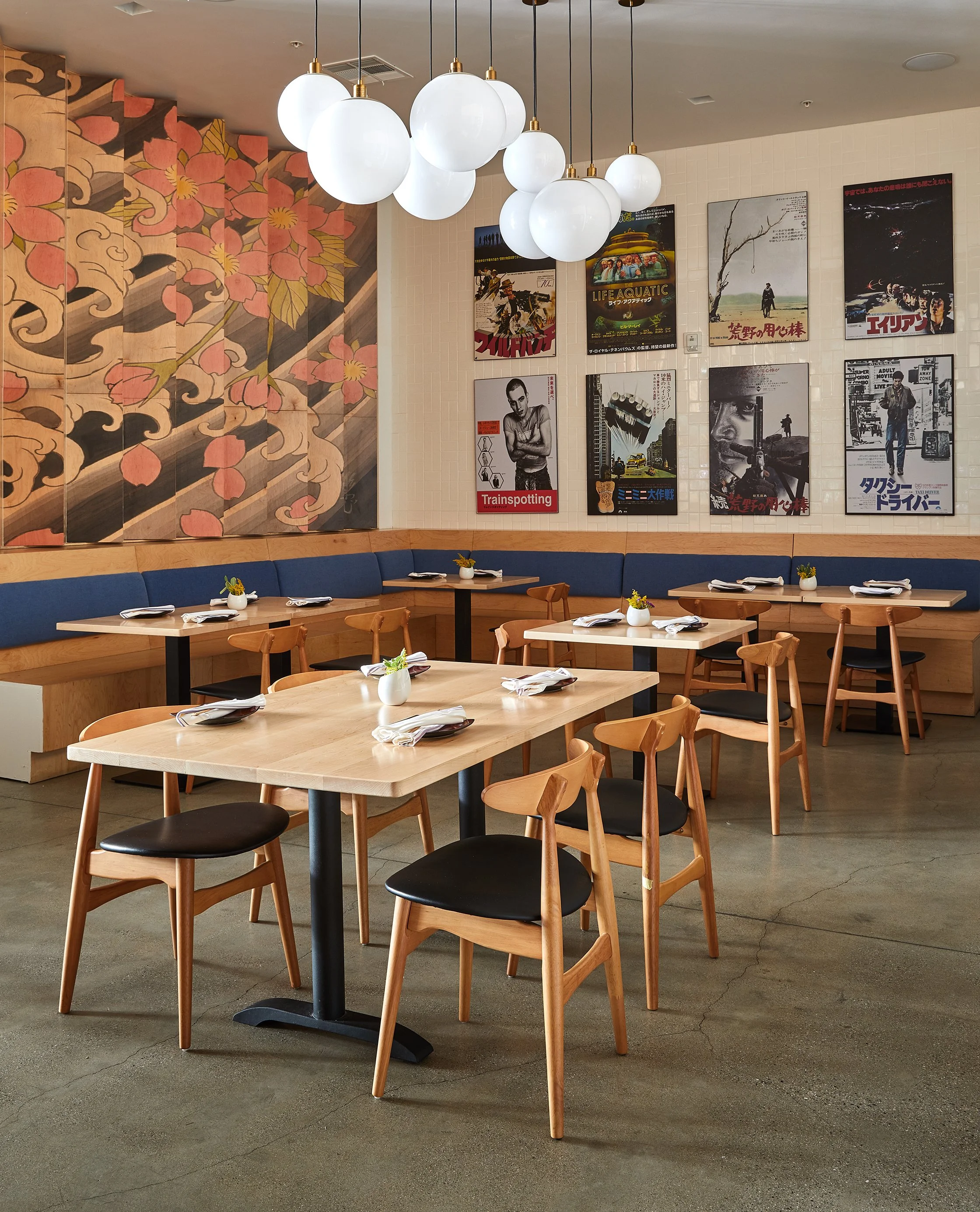 Architecture of Sake Dojo restaurant Little Tokyo, seating and wall art